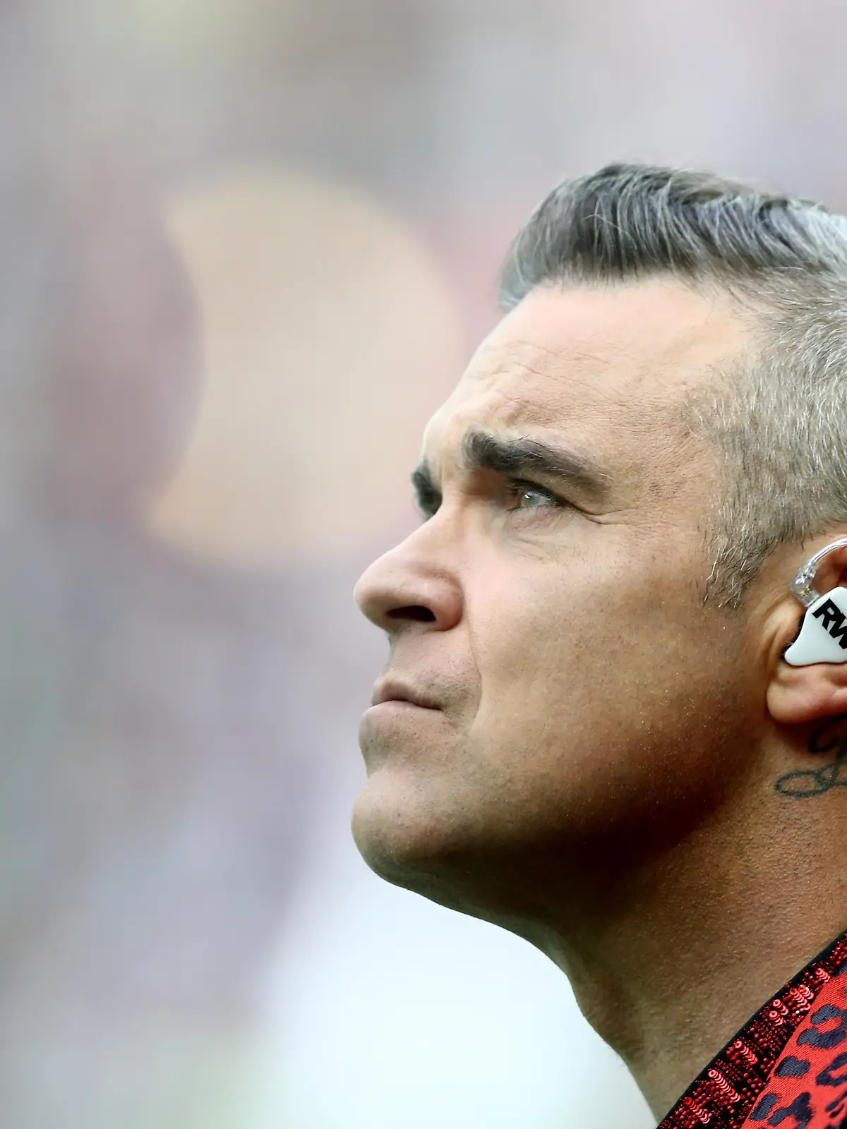 MOSCOW, RUSSIA - JUNE 14:  British popstar Robbie Williams performs during the opening ceremony prior to the 2018 FIFA World Cup Russia Group A match between Russia and Saudi Arabia at Luzhniki Stadium on June 14, 2018 in Moscow, Russia.  (Photo by Ryan Pierse/Getty Images)