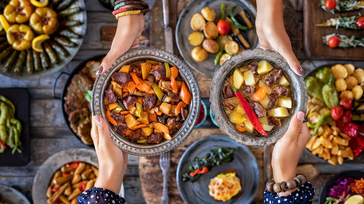 Cooked foods in the copper plate or pot.