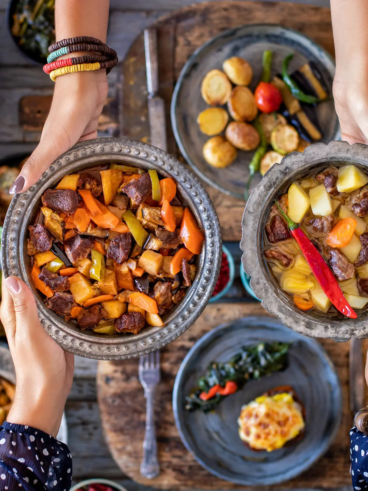 Cooked foods in the copper plate or pot.