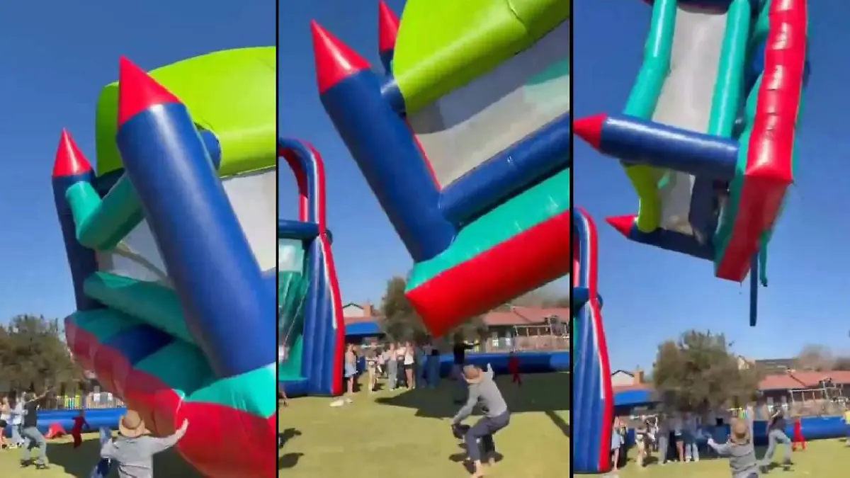 Wind erfasst Hüpfburg bei Schulfest