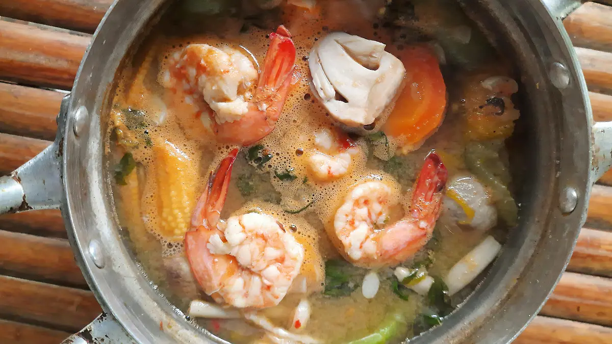 Spicy Mixed Vegetable soup with Shrimps - Thai food preparation.
