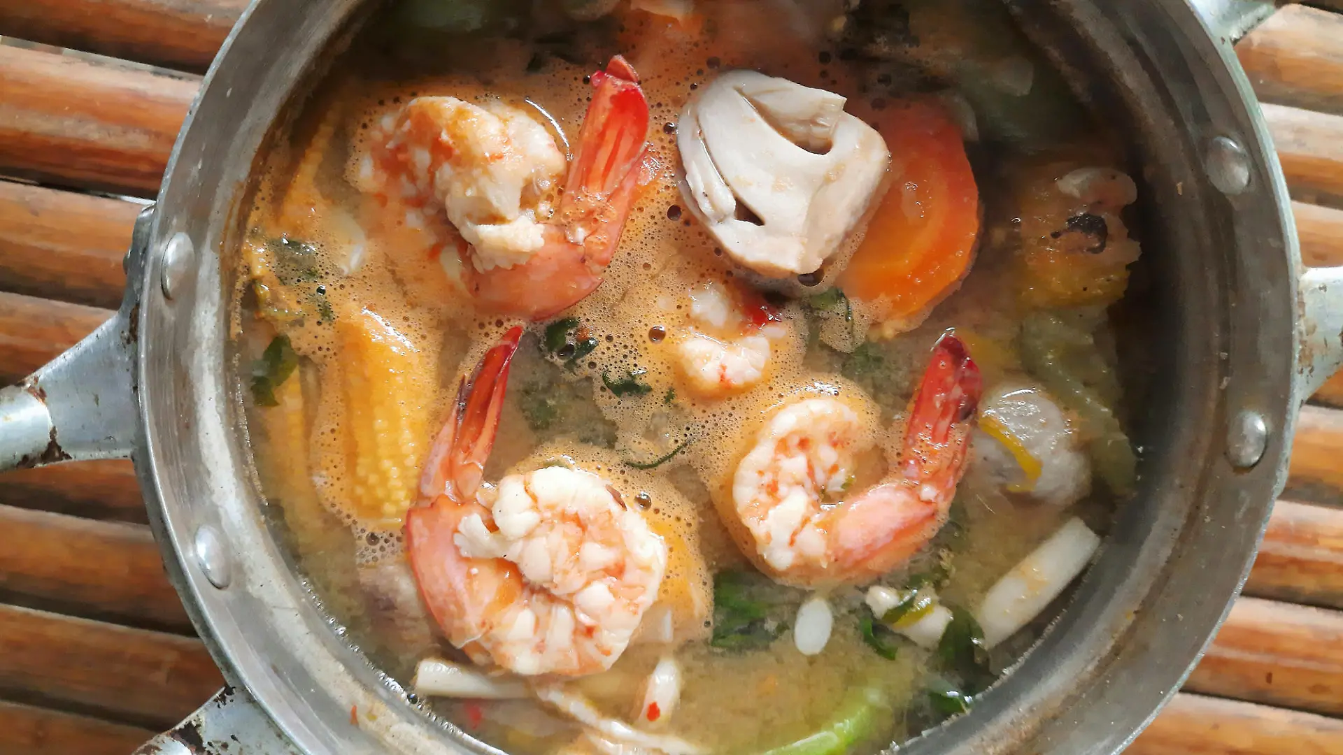 Spicy Mixed Vegetable soup with Shrimps - Thai food preparation.