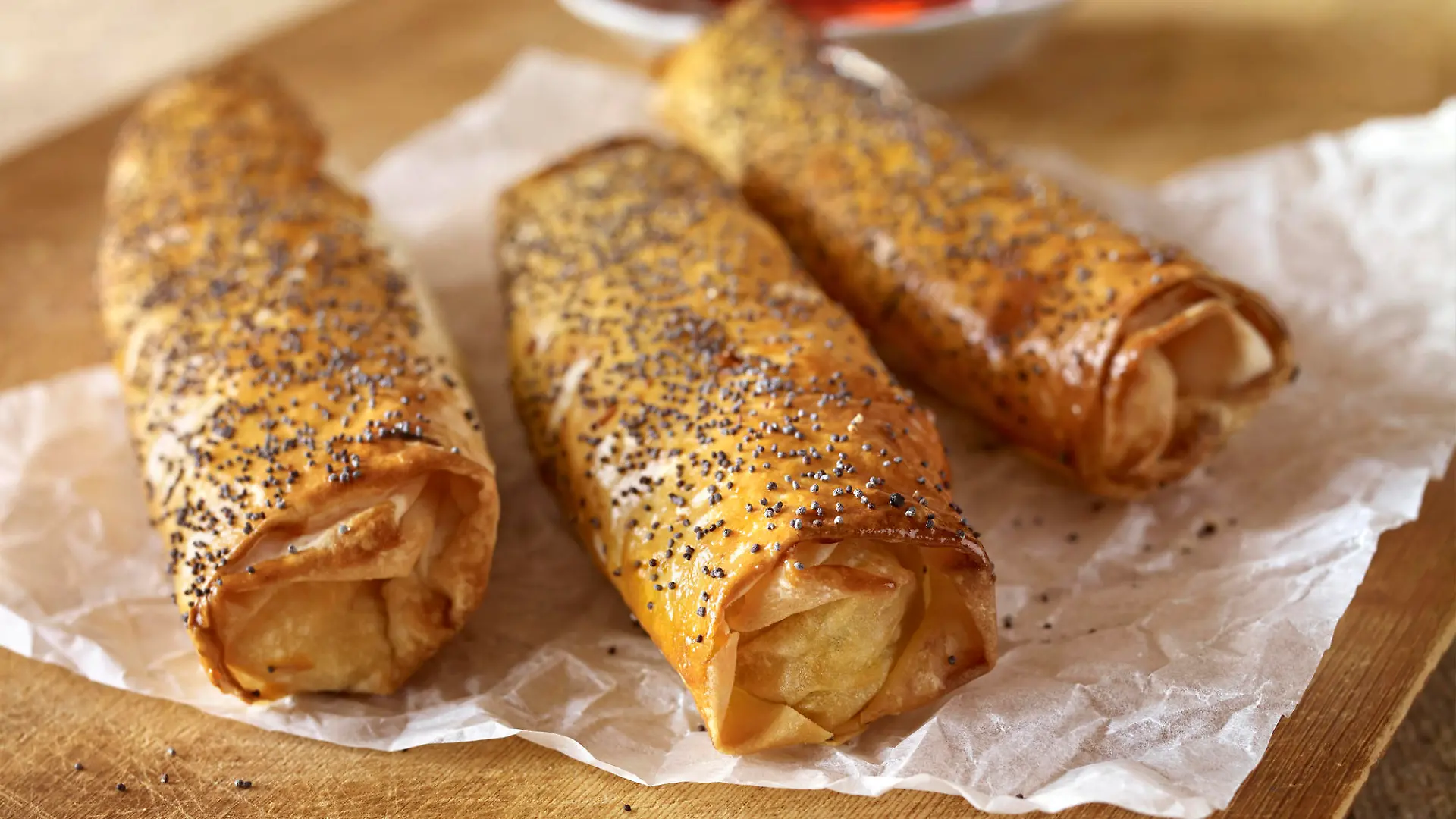 Rolled pastry boreks on a table setting