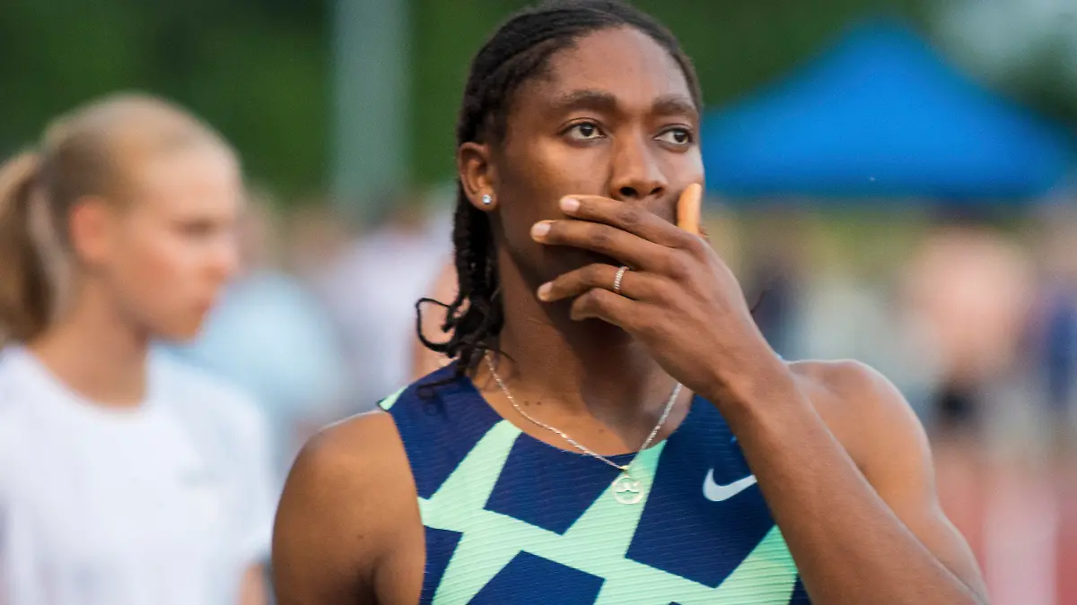 FILE - Caster Semenya reacts before the women's 5000 meter race in Regensburg, Germany, Saturday, June 19, 2021. Track and field banned transgender athletes from international competition Thursday, March 23, 2013, while adopting new regulations that could keep Caster Semenya and other athletes with differences in sex development from competing. (Stefan Puchner/dpa via AP, File)