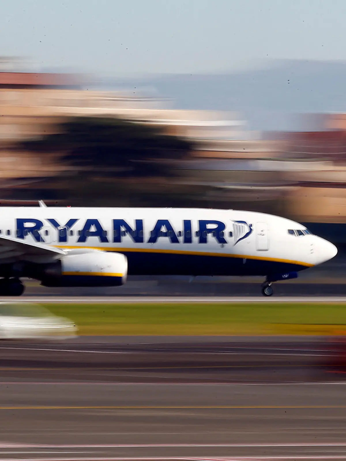 FILE PHOTO: A Ryanair aircraft lands at Ciampino Airport in Rome