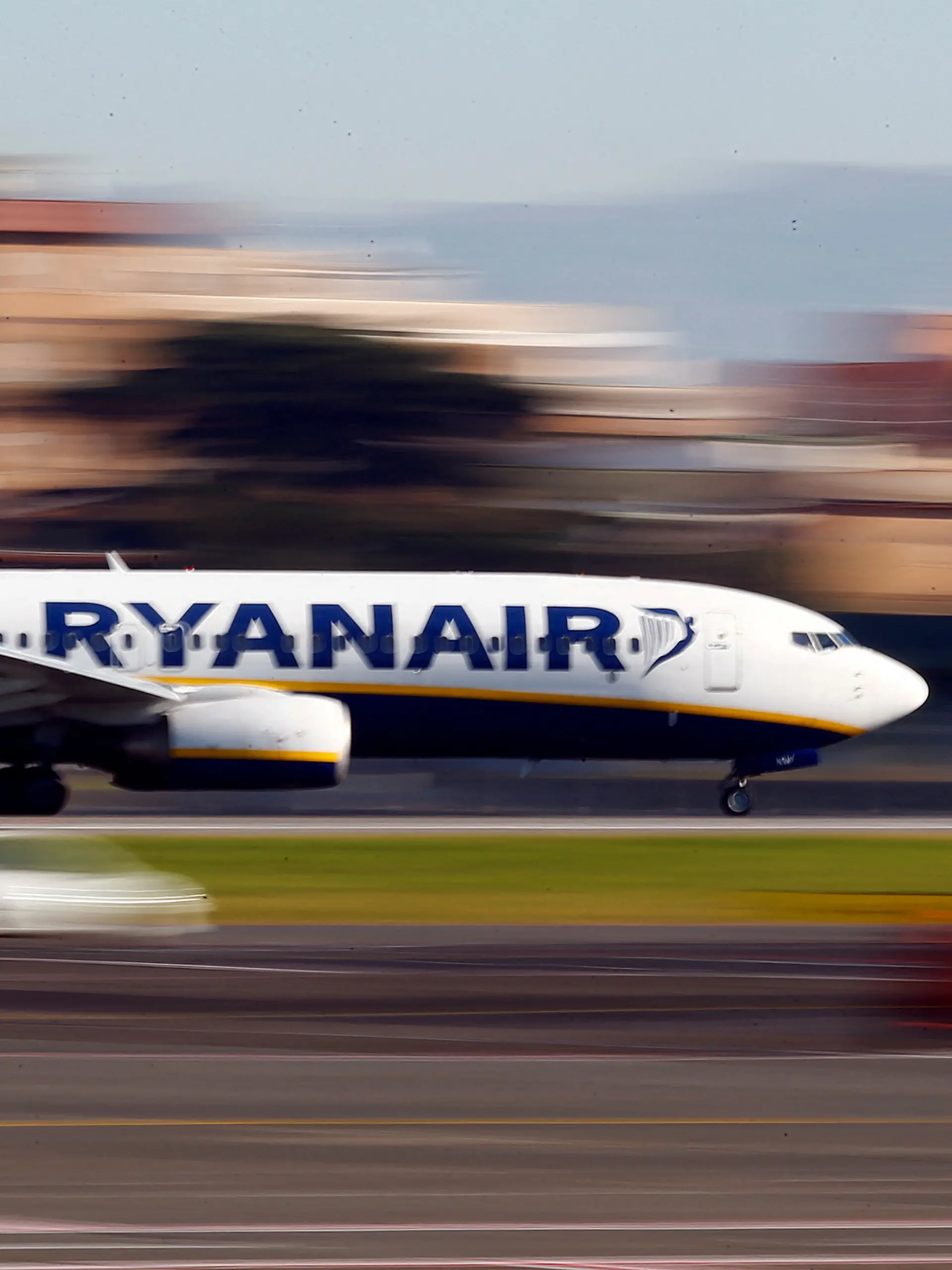 FILE PHOTO: A Ryanair aircraft lands at Ciampino Airport in Rome