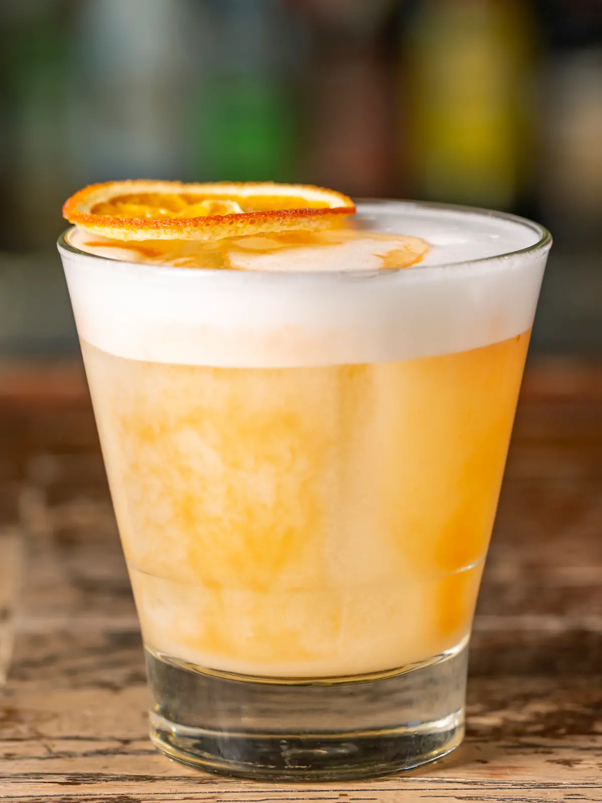 Ein cremiger orangefarbener Cocktail, wie zum Beispiel der Solero Spritz.