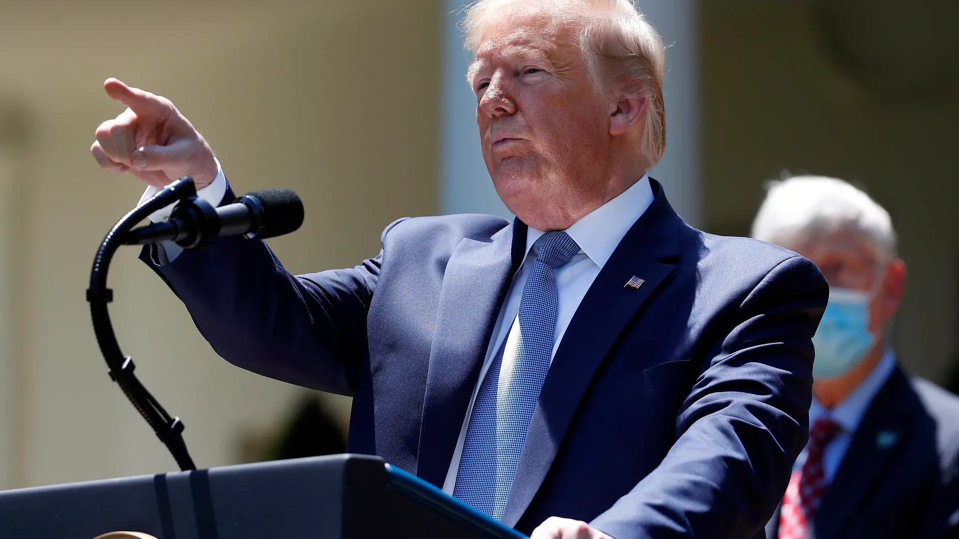President Donald Trump answers questions during a press briefing about the coronavirus in the Rose Garden of the White House, Friday, May 15, 2020, in Washington. (AP Photo/Alex Brandon)