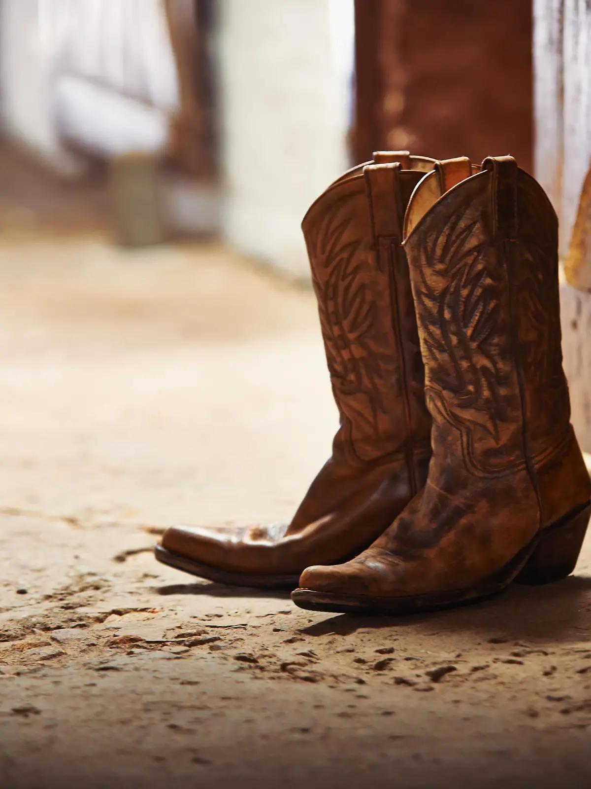 Shot of a pair of cowboy boots in a barn