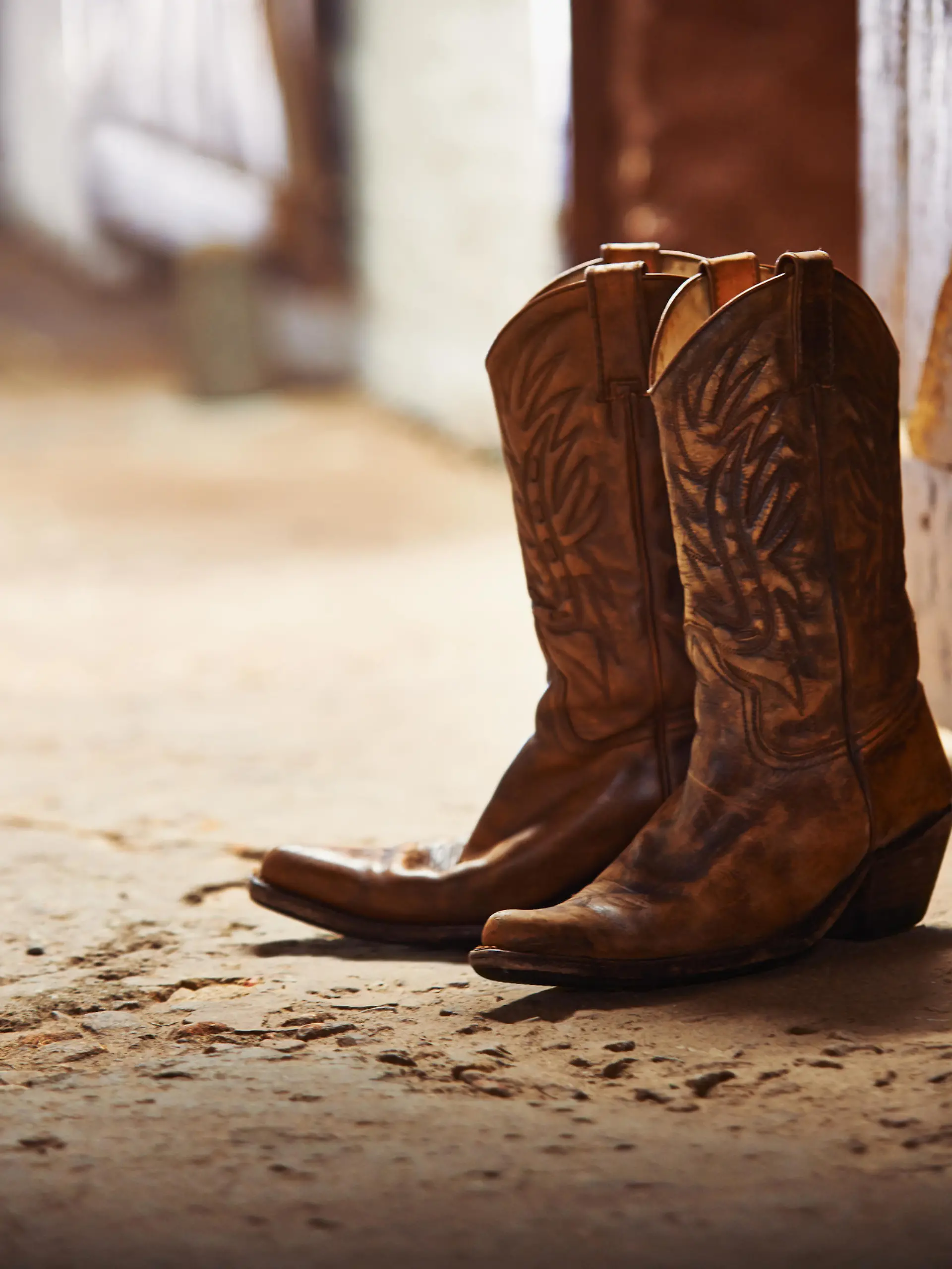 Shot of a pair of cowboy boots in a barn
