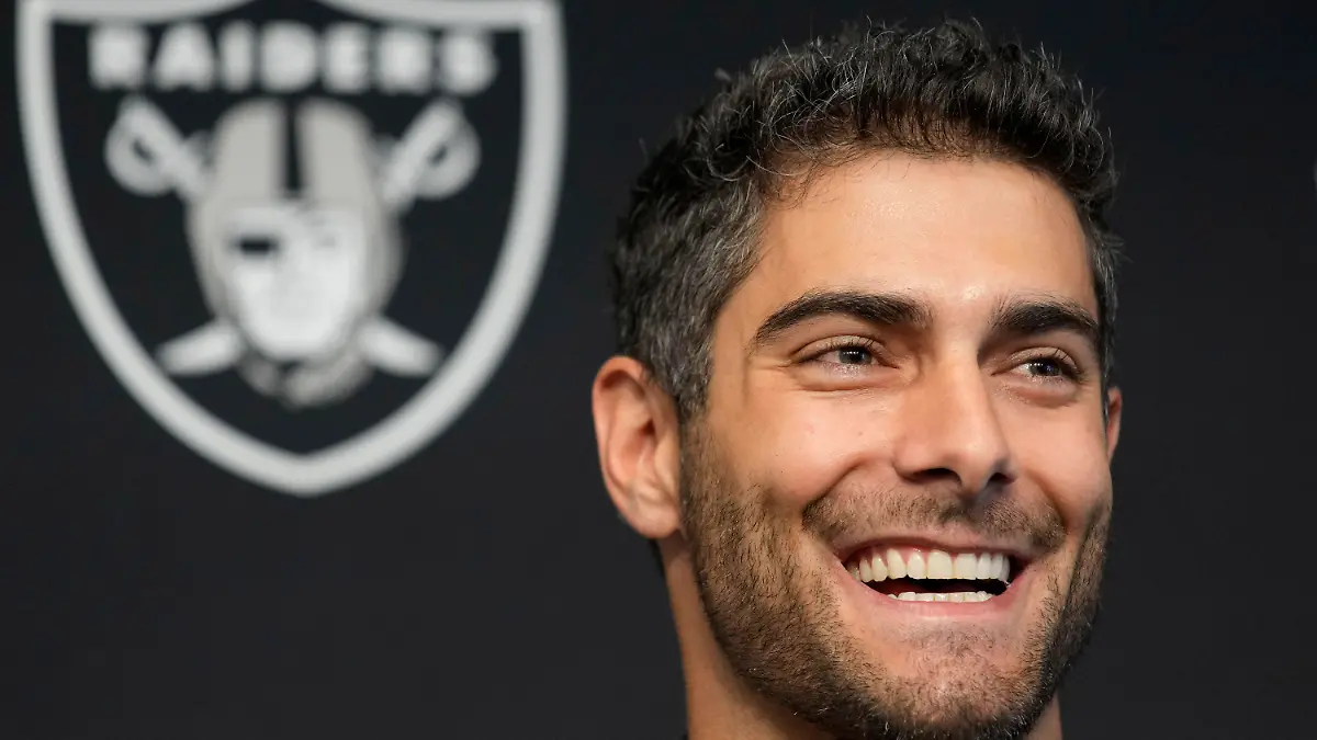 Las Vegas Raiders quarterback Jimmy Garoppolo takes questions at an NFL football news conference Friday, March 17, 2023, in Henderson, Nev. (AP Photo/John Locher)