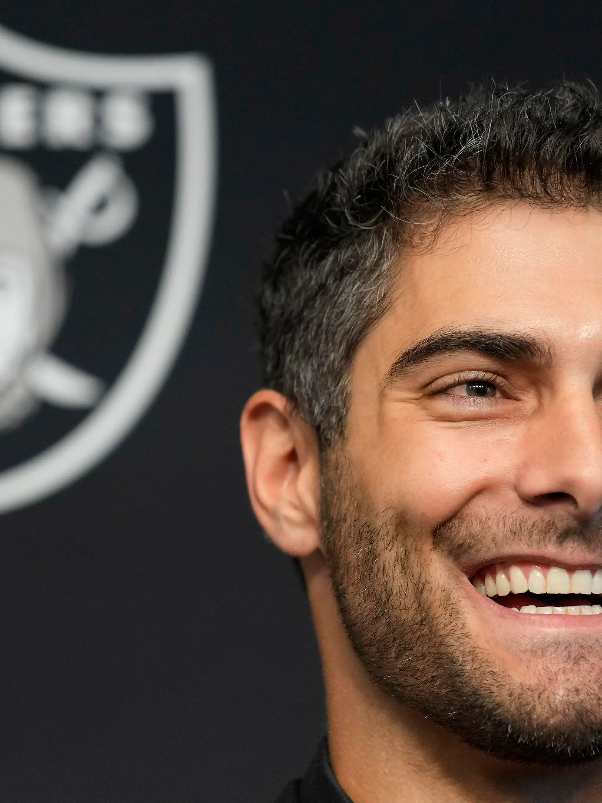 Las Vegas Raiders quarterback Jimmy Garoppolo takes questions at an NFL football news conference Friday, March 17, 2023, in Henderson, Nev. (AP Photo/John Locher)