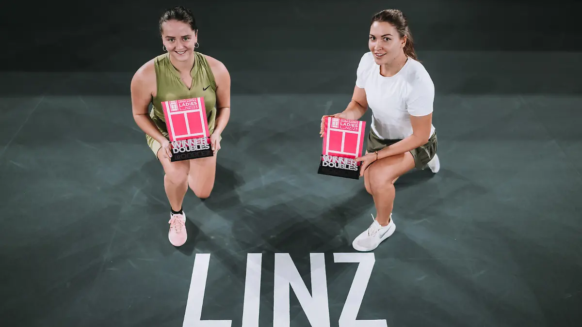 LINZ, AUSTRIA - FEBRUARY 12: (EDITOR'S NOTE: Image has been digitally enhanced) Natela Dzalamidze of Georgia and Viktoria Kuzmova of Slovakia celebrate winning during day seven of the Upper Austria Ladies Linz 2023 on February 12, 2023 in Linz, Austria. (Photo by Alexander Scheuber/Getty Images for MatchMaker)