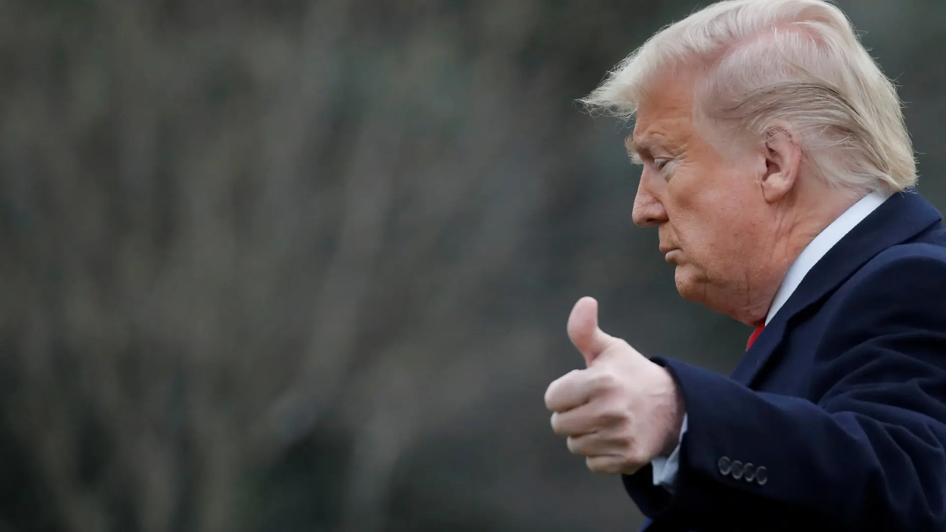 FILE PHOTO: U.S. President Donald Trump gestures to reporters as he departs for travel to Scranton, Pennsylvania from the South Lawn of the White House in Washington, U.S., March 5, 2020. REUTERS/Carlos Barria/File Photo