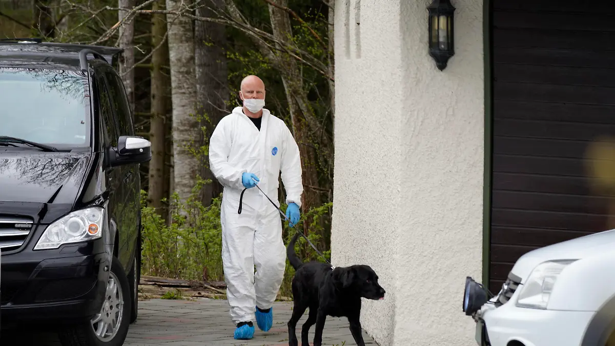 Police investigators at the home in Lorenskog near Oslo, after Anne-Elisabeth Hagen's husband Tom Hagen was arrested for investigation into the disappearance of his wife, Tuesday April 28, 2020. Anne-Elisabeth Hagen has been missing for a year and a half. (Heiko Junge / NTB scanpix via AP)