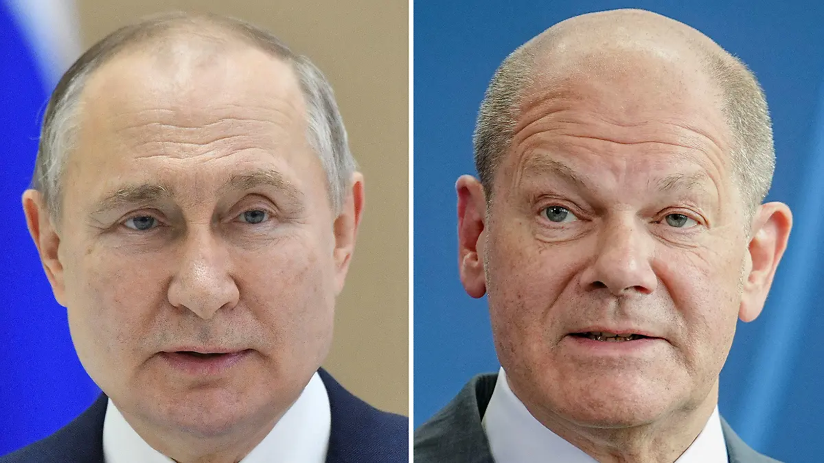 ARCHIV - 13.05.2022, ---: Die Kombo zeigt Russlands Präsident Wladimir Putin (Foto von der staatlichen russischen Nachrichtenagentur Sputnik über AP) und Bundeskanzler Olaf Scholz (SPD) bei einer Pressekonferenz im Bundeskanzleramt. Bundeskanzler Olaf Scholz und Russlands Präsident Wladimir Putin haben nach Angaben aus Moskau wieder miteinander telefoniert. Foto: ---Kay Nietfeld/dpa/AP/sputnik/dpa +++ dpa-Bildfunk +++