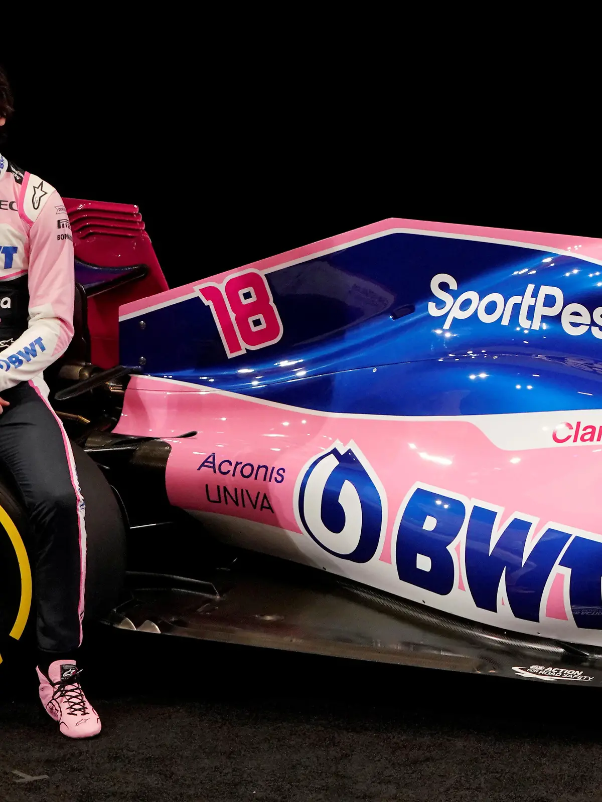 SportPesa Racing Point F1 Team driver Lance Stroll poses after unveiling the team's new car livery at a pre-season launch event at the Canadian International AutoShow in Toronto, Ontario, Canada, February 13, 2019. REUTERS/Mark Blinch