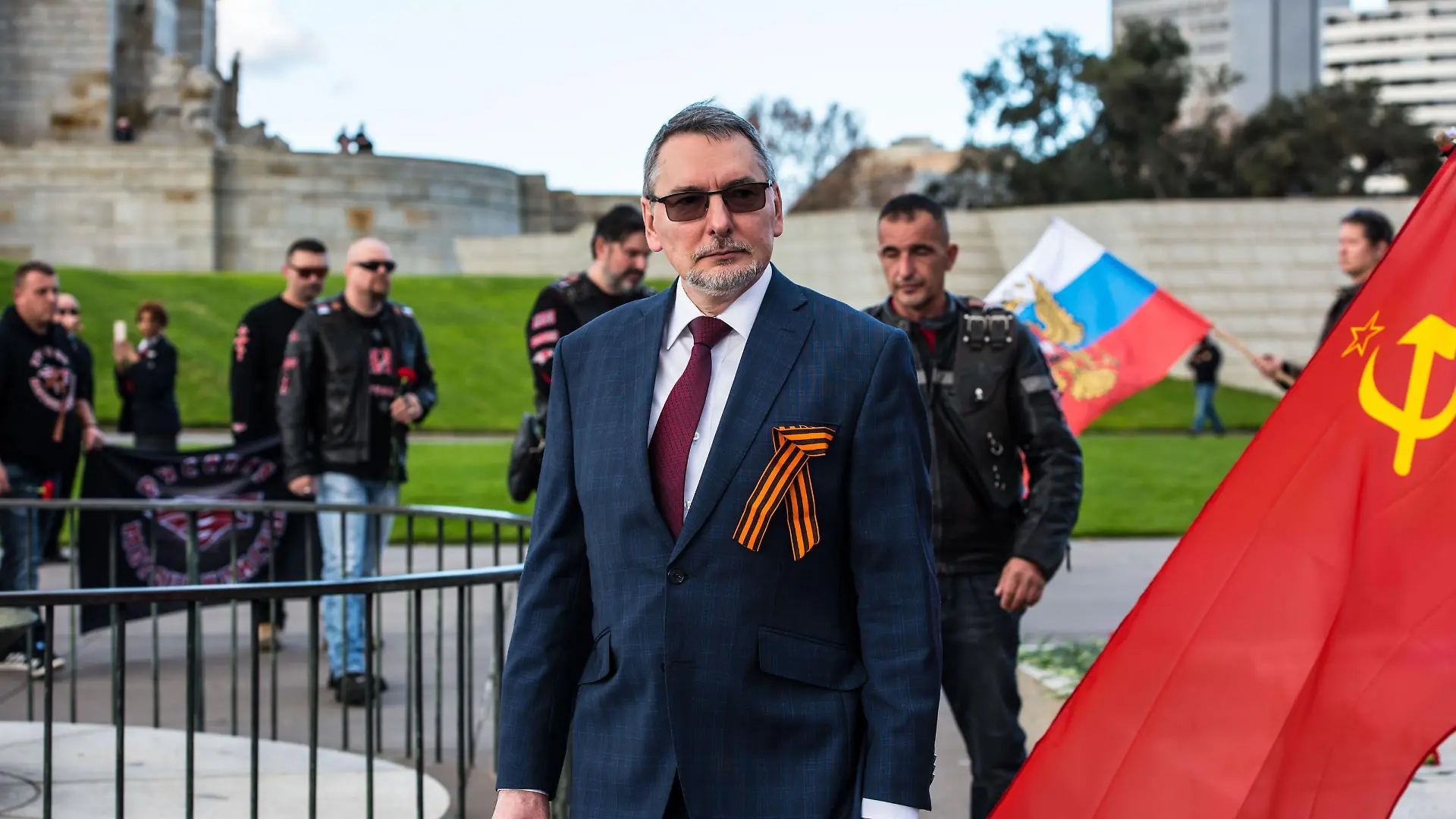 2FMKM5D Melbourne, Australia, 09/05/2021, Russian Ambassador to Australia, Alexey Pavlovsky seen after laying flowers at the memorial near eternal flame. "Immortal Regiment", a part of Victory Day celebration on the 9th of May at the Shrine of Remembrance memorial in Melbourne. The Immortal Regiment march was attended by Russian Ambassador to Australia and a First Secretary of the Russian Embassy and is part of a global celebration of Victory. People with flags, banners and most importantly photos of their family members who fought in World War 2 marched through streets of Melbourne. The march commemo