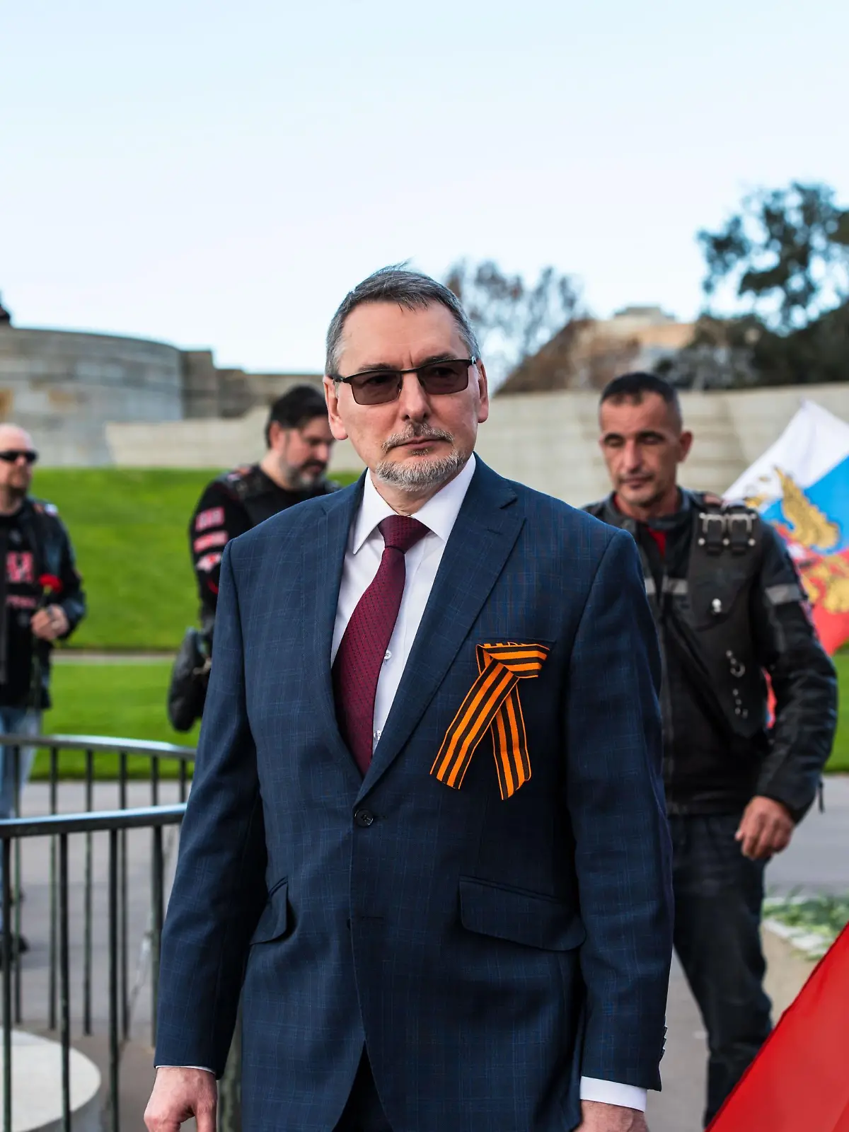2FMKM5D Melbourne, Australia, 09/05/2021, Russian Ambassador to Australia, Alexey Pavlovsky seen after laying flowers at the memorial near eternal flame. "Immortal Regiment", a part of Victory Day celebration on the 9th of May at the Shrine of Remembrance memorial in Melbourne. The Immortal Regiment march was attended by Russian Ambassador to Australia and a First Secretary of the Russian Embassy and is part of a global celebration of Victory. People with flags, banners and most importantly photos of their family members who fought in World War 2 marched through streets of Melbourne. The march commemo
