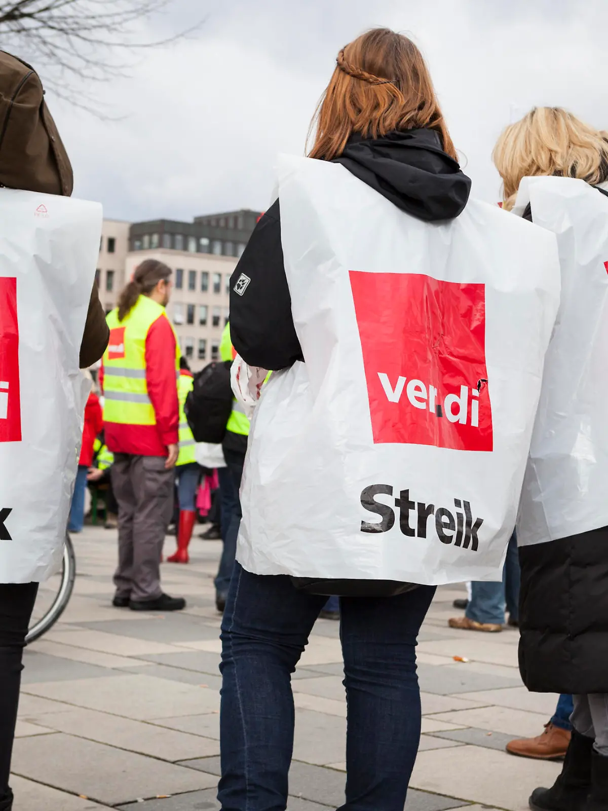 Wiesbaden, Germany - March 19, 2014: Participants of a warning strike and demonstration for higher wages in public services in the city center of Wiesbaden, Germany. The demonstration was organized by german trade union verdi.