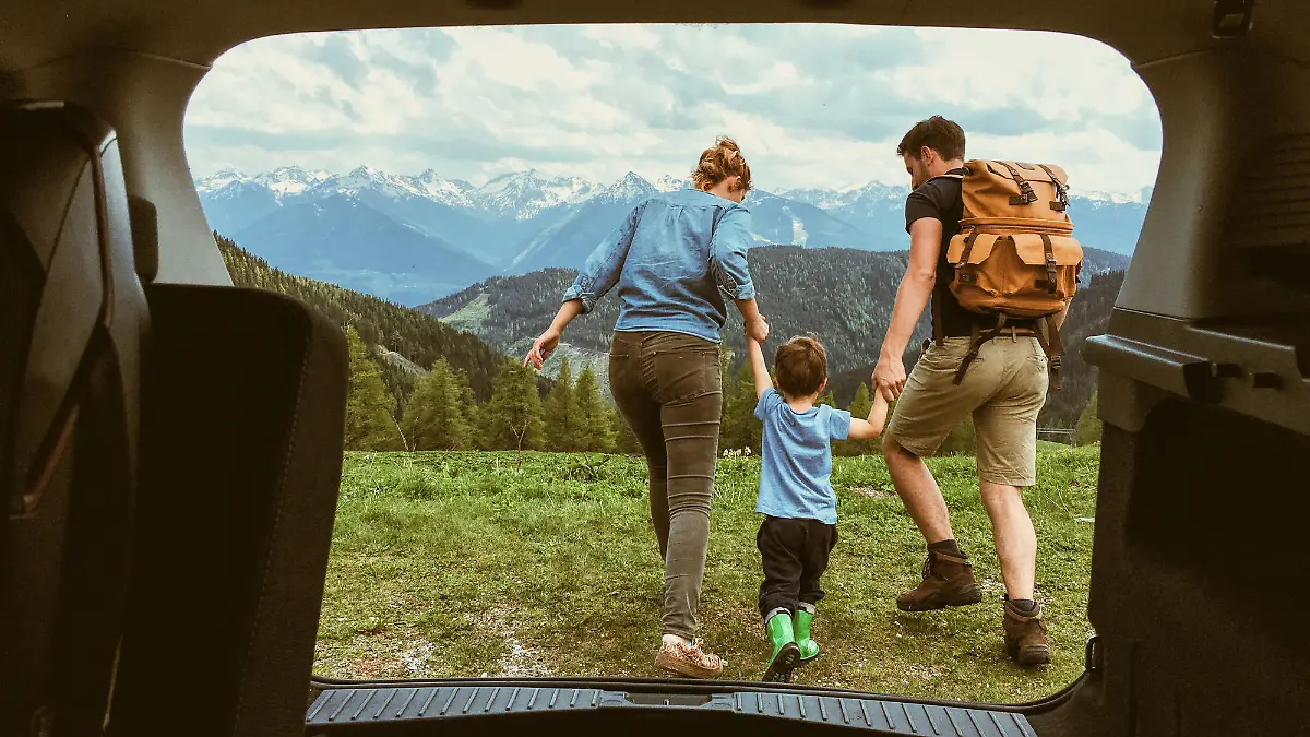Young family enjoying the nature of the Austrian Alps