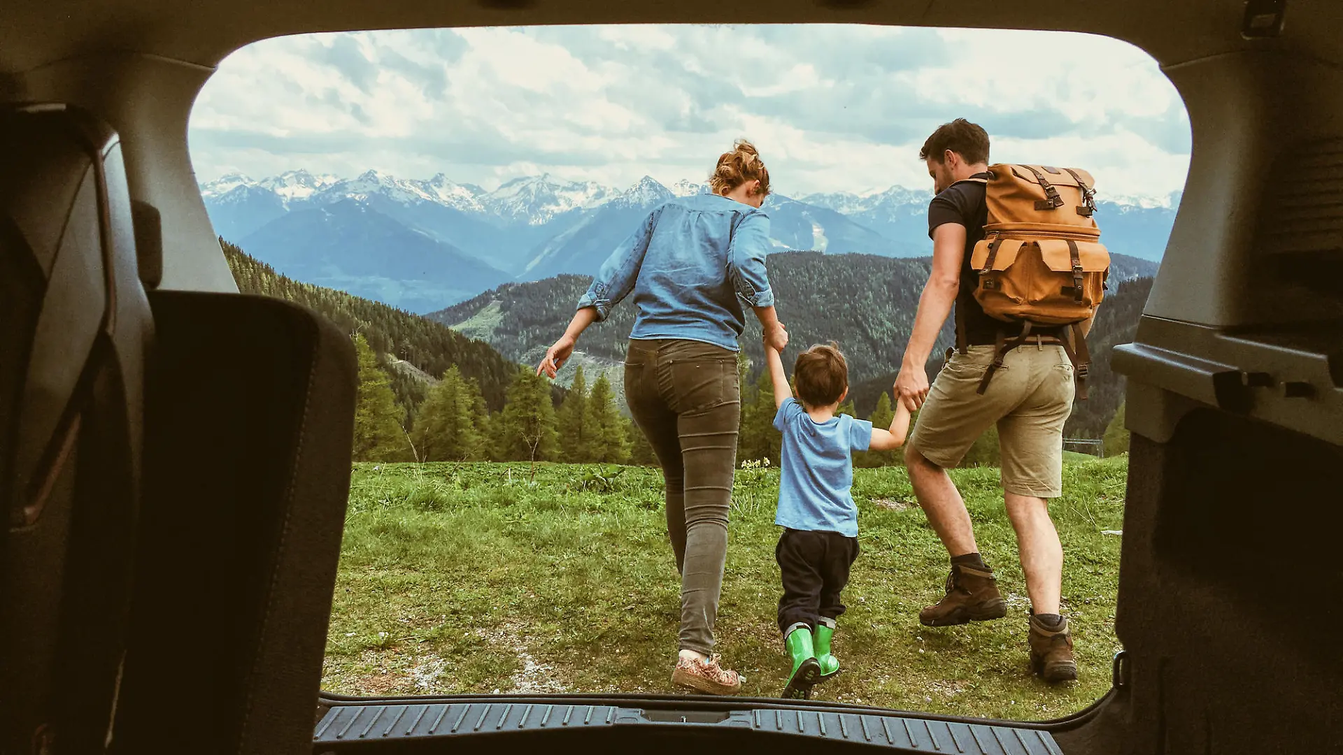 Young family enjoying the nature of the Austrian Alps