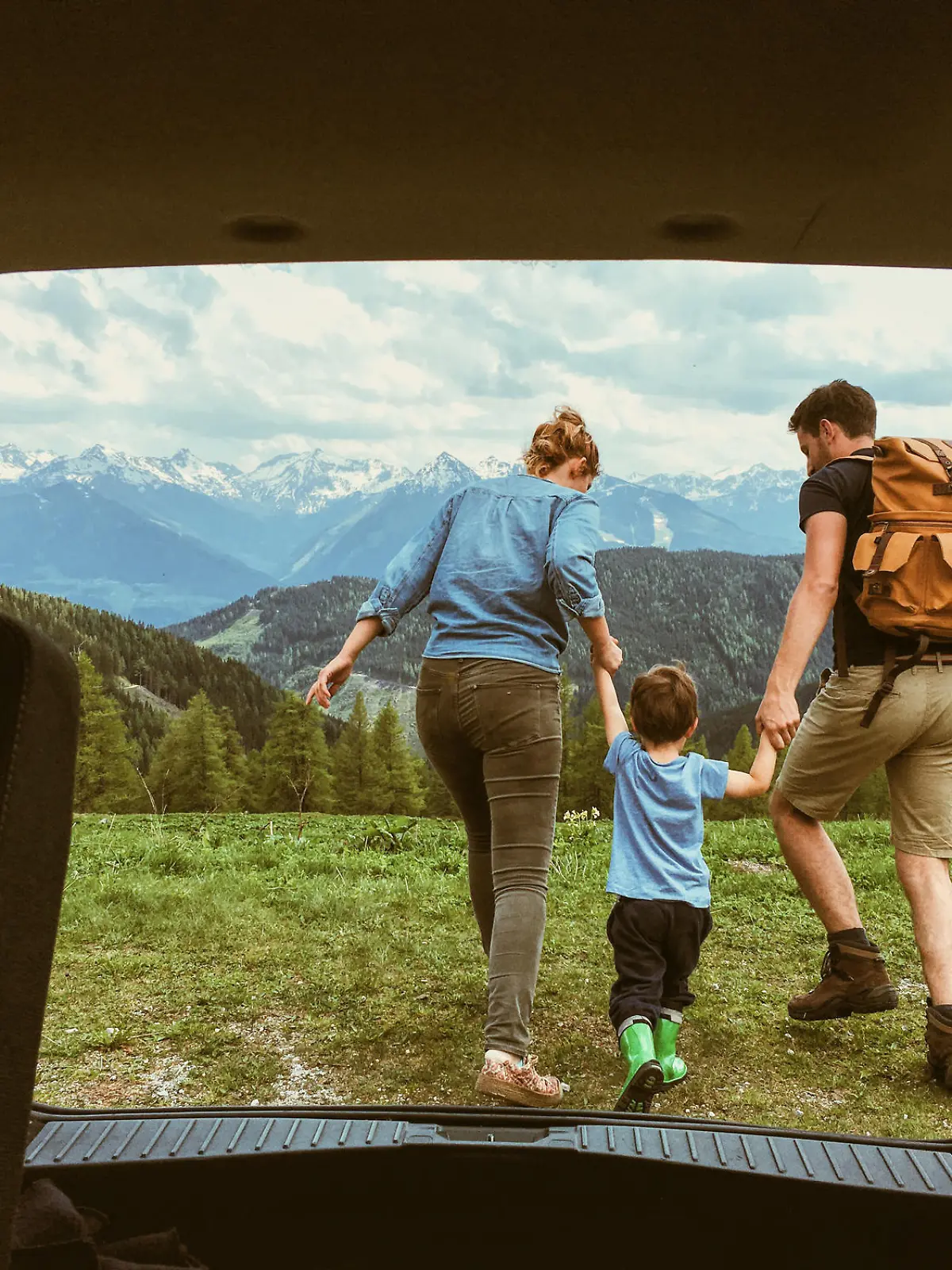 Young family enjoying the nature of the Austrian Alps