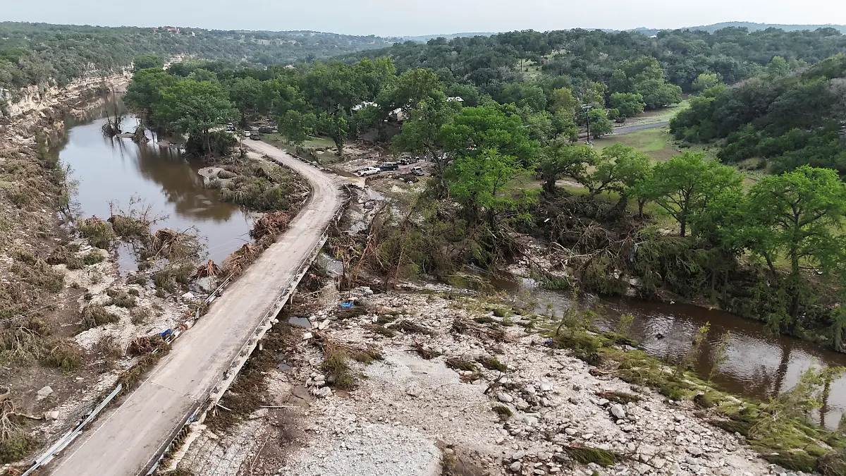 epi_228419409_REUTERSFOTO_2025-07-06T034536Z 1522546178 RC2505ARE97P RTRMADP 3 USA-WEATHER-TEXAS-FLOODING.JPG_A drone view shows t.jpg