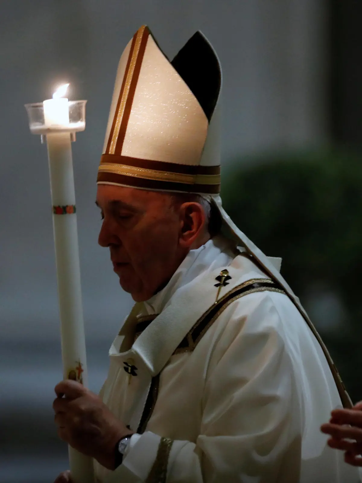 Pope Francis leads the Easter vigil Mass in St. Peter's Basilica with no public participation due to the outbreak of the coronavirus disease (COVID-19) at the Vatican, April 11, 2020. REUTERS/Remo Casilli/Pool