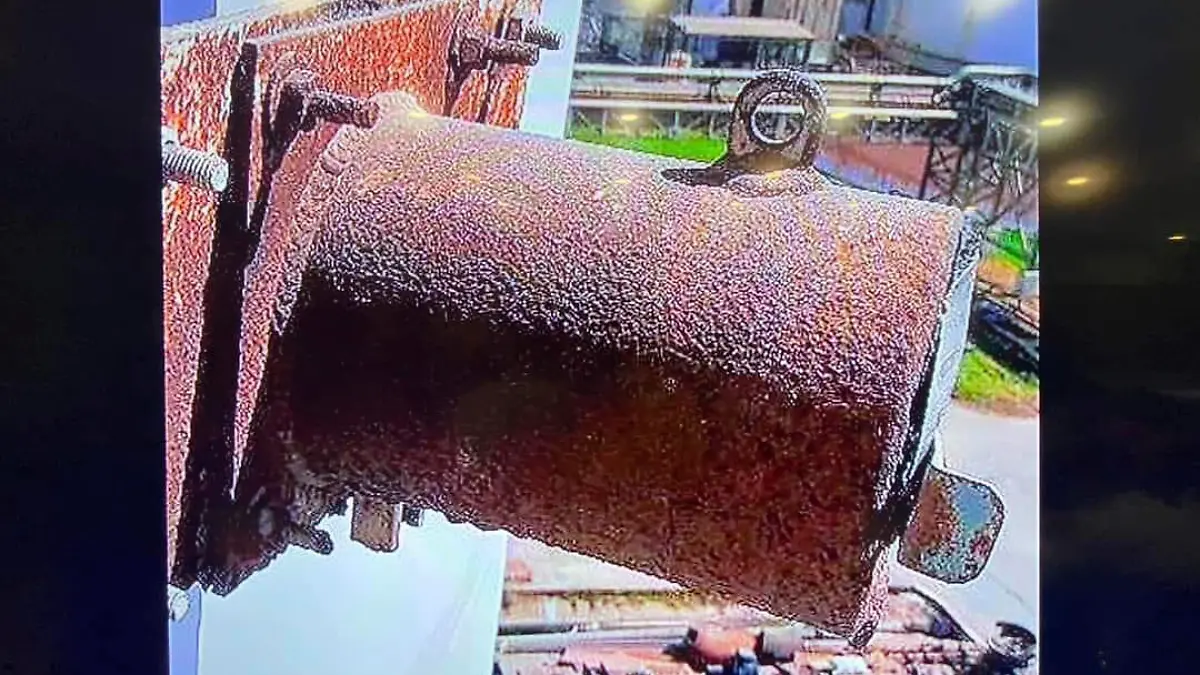 This image made on March 14, 2023, from the 2022 video provided by the Prachinburi Provincial Public Relations Office, shows a radioactive cylinder, a steel tube, 30 cm (12 inches) long and 13 cm (5 inches) diameter that has gone missing from a steam power plant in Thailand's eastern province of Prachinburi. The video was taken in December 2022. (The Prachinburi Provincial Public Relations Office via AP)