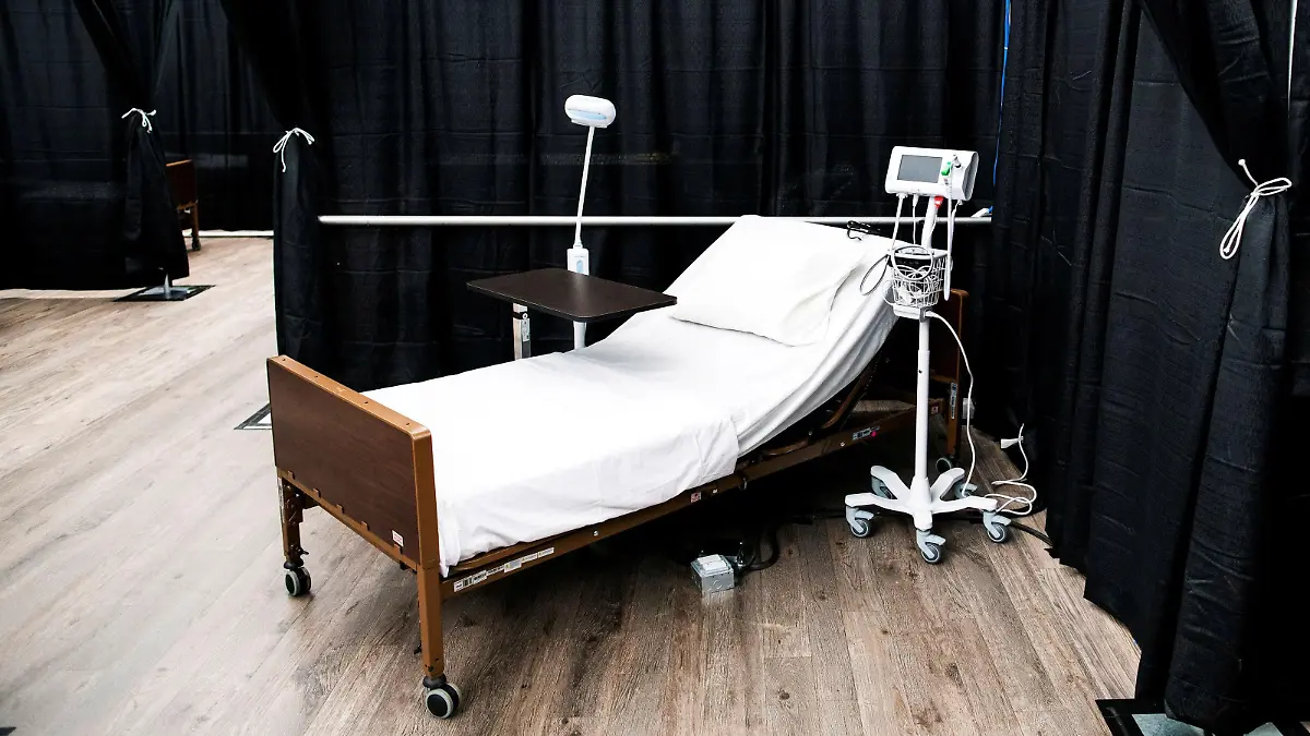 A bed is seen set up in a temporary hospital located at the USTA Billie Jean King National Tennis Center before the press conference of New York City Mayor Bill De Blasio as the outbreak of the coronavirus disease (COVID-19) continues in the Queens borough of New York City, New York, U.S., April 10, 2020. REUTERS/Eduardo Munoz TPX IMAGES OF THE DAY