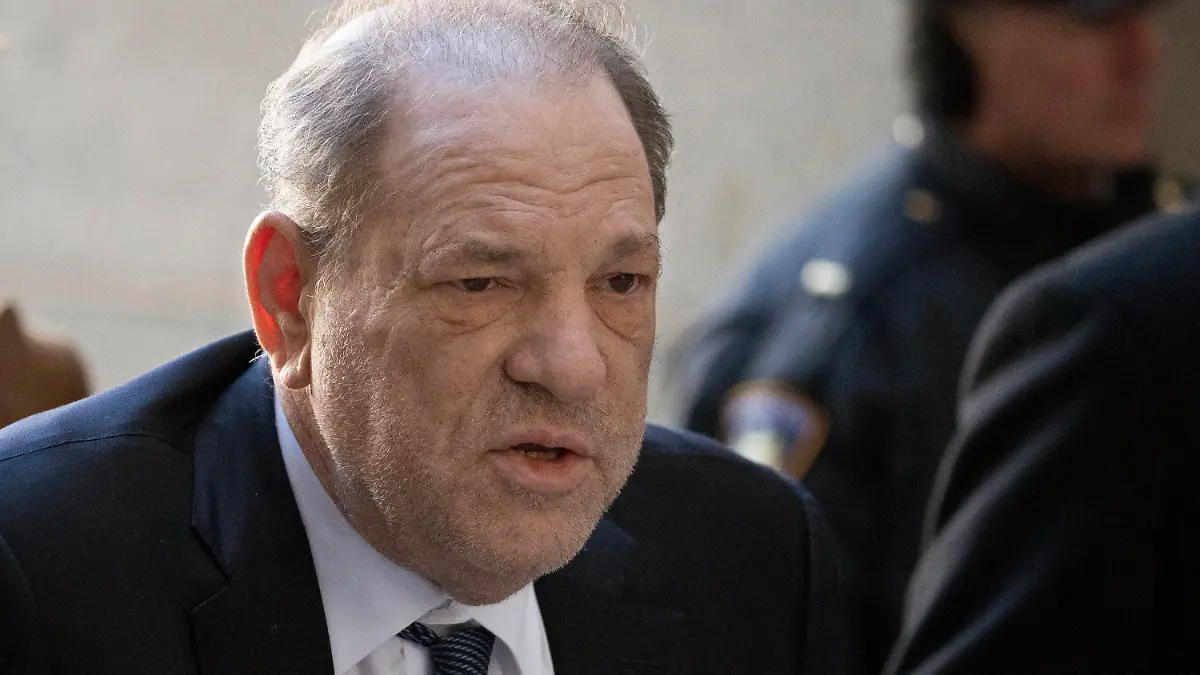 FILE - In this Feb. 21, 2020 file photo, Harvey Weinstein arrives at a Manhattan court as jury deliberations continue in his rape trial in New York. On Wednesday, March 18, the disgraced film mogul was transferred from New York City's notorious Rikers Island jail complex to the to the maximum security Wende Correctional Facility near Buffalo, N.Y. (AP Photo/Mark Lennihan, File)
