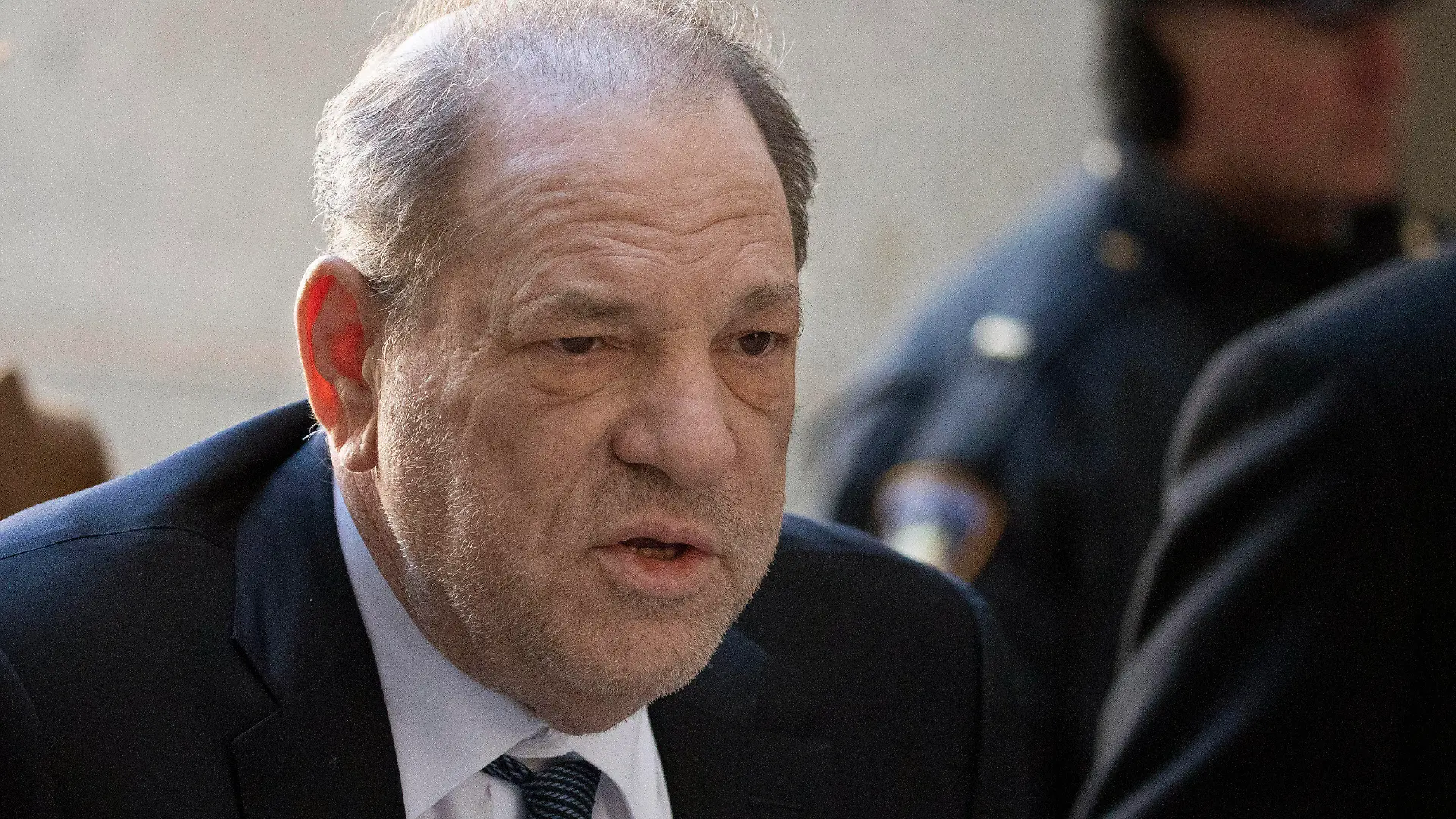 FILE - In this Feb. 21, 2020 file photo, Harvey Weinstein arrives at a Manhattan court as jury deliberations continue in his rape trial in New York. On Wednesday, March 18, the disgraced film mogul was transferred from New York City's notorious Rikers Island jail complex to the to the maximum security Wende Correctional Facility near Buffalo, N.Y. (AP Photo/Mark Lennihan, File)