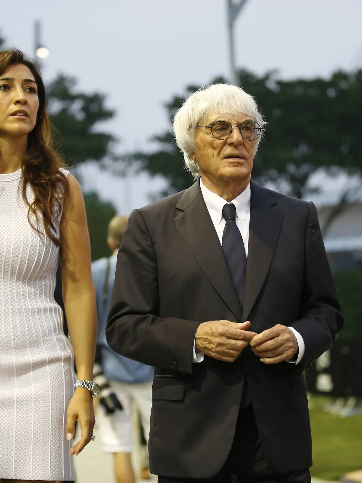  Marina Bay Circuit, Singapore. Thursday 18 September 2014. Bernie Ecclestone, CEO and President, FOM and Fabiana Flosi. World 89P3003 PUBLICATIONxINxGERxSUIxAUTxHUNxONLY