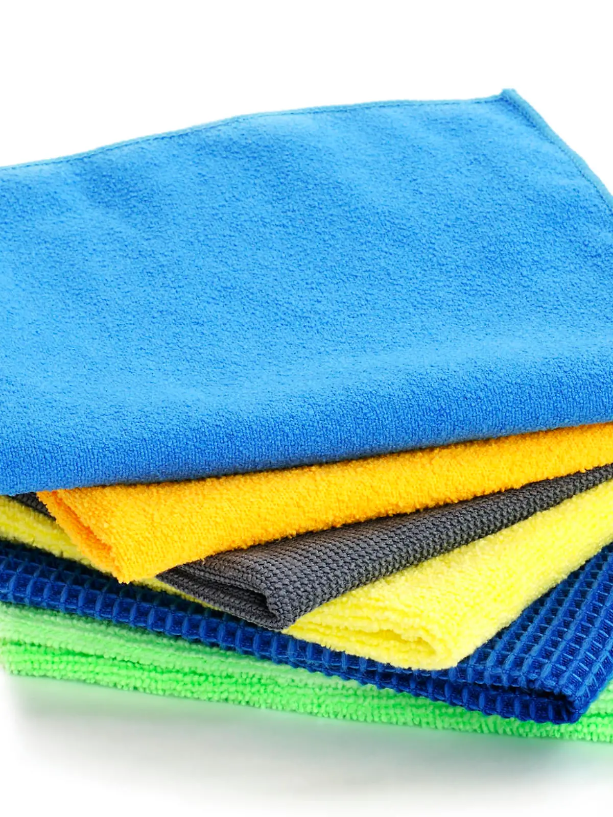 Pile of various multicolor microfibre cloths