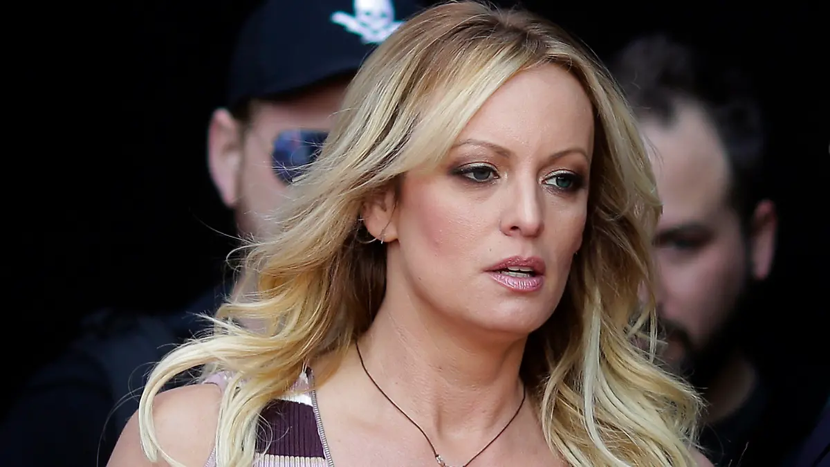 FILE - Adult film actress Stormy Daniels arrives for the opening of the adult entertainment fair Venus in Berlin, on Oct. 11, 2018. Daniels' lawyer said she met Wednesday, March 15, 2023, with prosecutors who are investigating hush money paid to her on behalf of former President Donald Trump. (AP Photo/Markus Schreiber, File)