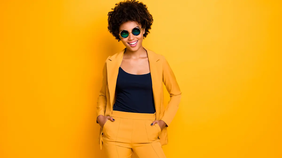 Portrait of her she nice-looking well-dressed fashionable attractive, pretty lovely cheerful cheery content wavy-haired girl isolated over bright vivid shine vibrant yellow color background