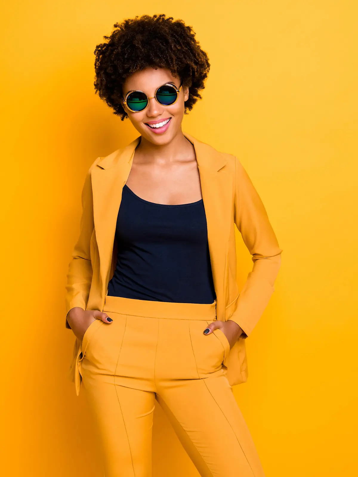 Portrait of her she nice-looking well-dressed fashionable attractive, pretty lovely cheerful cheery content wavy-haired girl isolated over bright vivid shine vibrant yellow color background