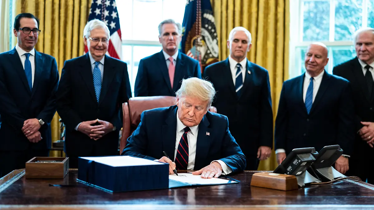 United States President Donald J. Trump participates in a signing ceremony for a two trillion dollar coronavirus relief bill in the Oval Office at the White House in Washington, DC on March 27, 2020. 

Standing behind the President from left to right: US Secretary of the Treasury Steven T. Mnuchin; US Senate Majority Leader Mitch McConnell (Republican of Kentucky); US House Minority Leader Kevin McCarthy (Republican of California); US Vice President Mike Pence; US Representative Kevin Brady (Republican of Texas) and US Representative Steve Chabot (Republican of Ohio).

Credit: Erin Schaff / Pool via CNP/AdMedia

Pictured: Donald Trump,Steven Mnuchin,Mitch McConnell,Kevin McCarthy,Mike Pence
Ref: SPL5159388 270320 NON-EXCLUSIVE
Picture by: Erin Schaff / Pool via CNP/AdMedia / SplashNews.com

Splash News and Pictures
Los Angeles: 310-821-2666
New York: 212-619-2666
London: +44 (0)20 7644 7656
Berlin: +49 175 3764 166
photodesk@splashnews.com

World Rights, No Canada Rights, No United Kingdom Rights, No United States of America Rights
