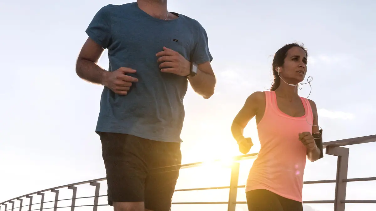 woman and man running