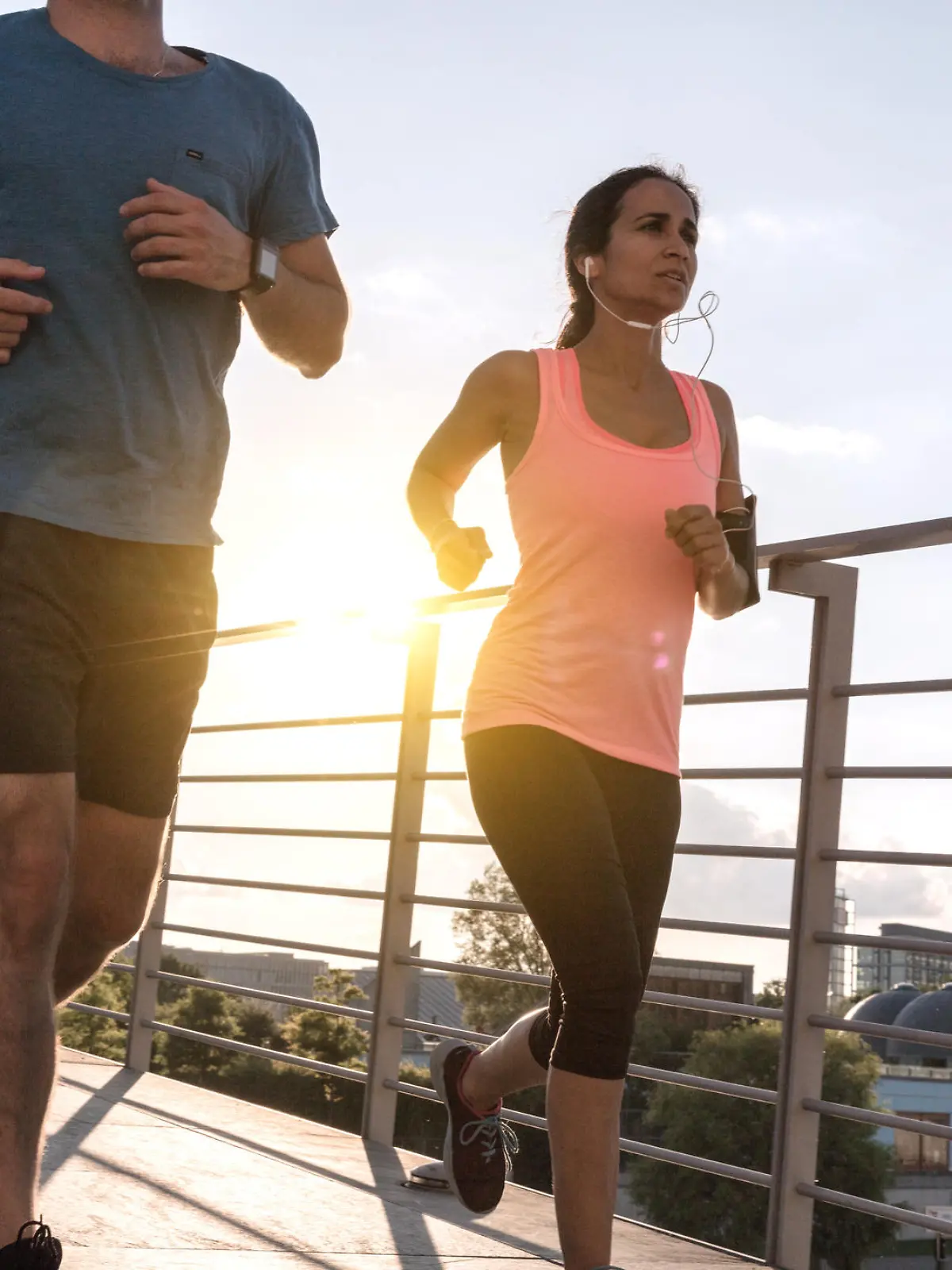 woman and man running