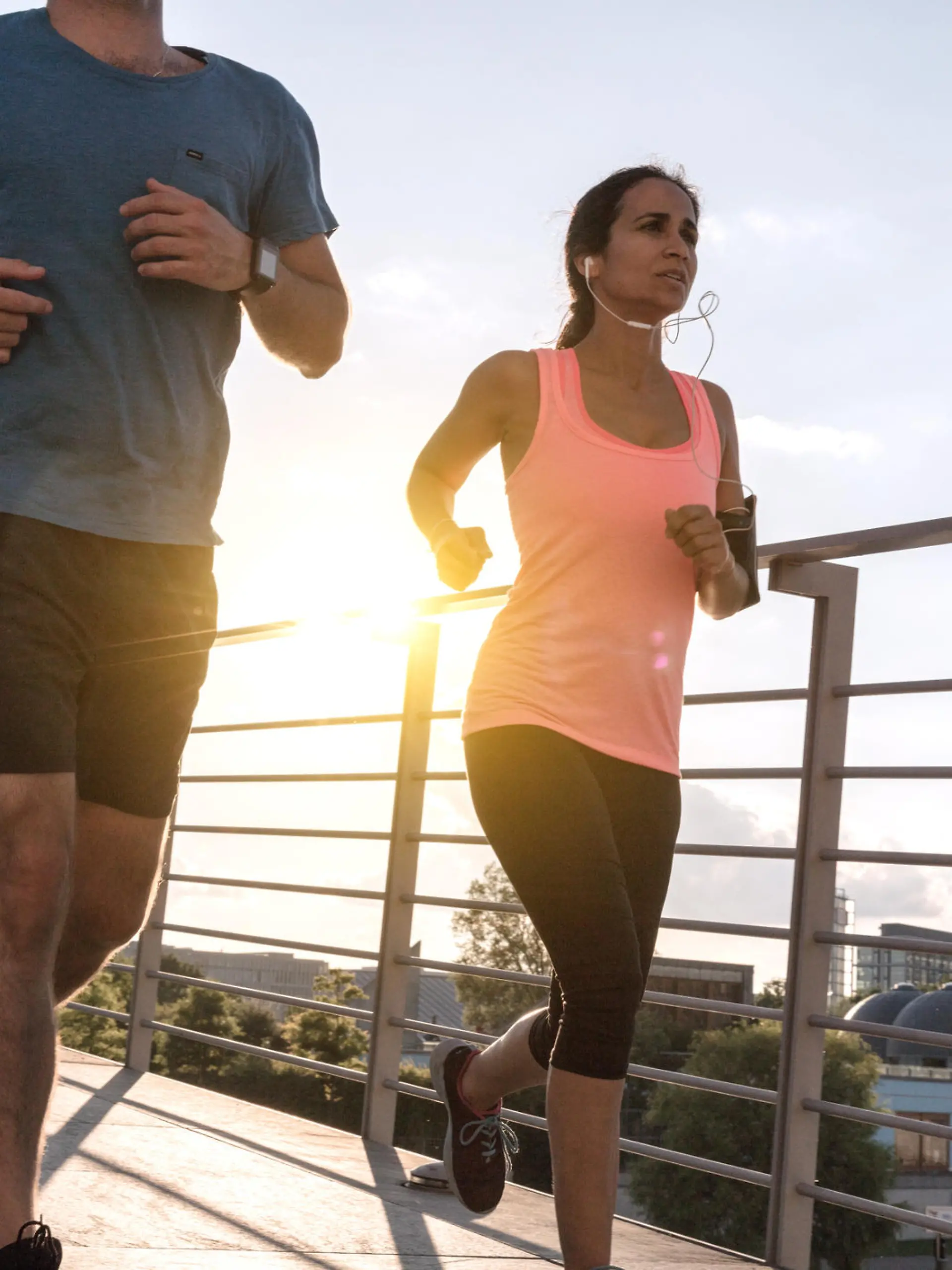 woman and man running