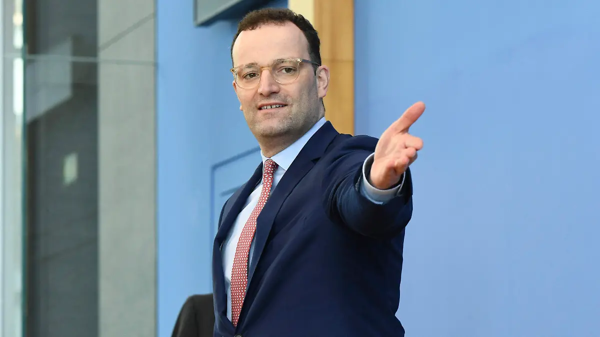 German Health Minister Jens Spahn arrives for a news conference about the spread of coronavirus disease in Berlin, Germany, Thursday, March 26, 2020. The new coronavirus causes mild or moderate symptoms for most people, but for some, especially older adults and people with existing health problems, it can cause more severe illness or death. (Annegret Hilse/Pool via AP)