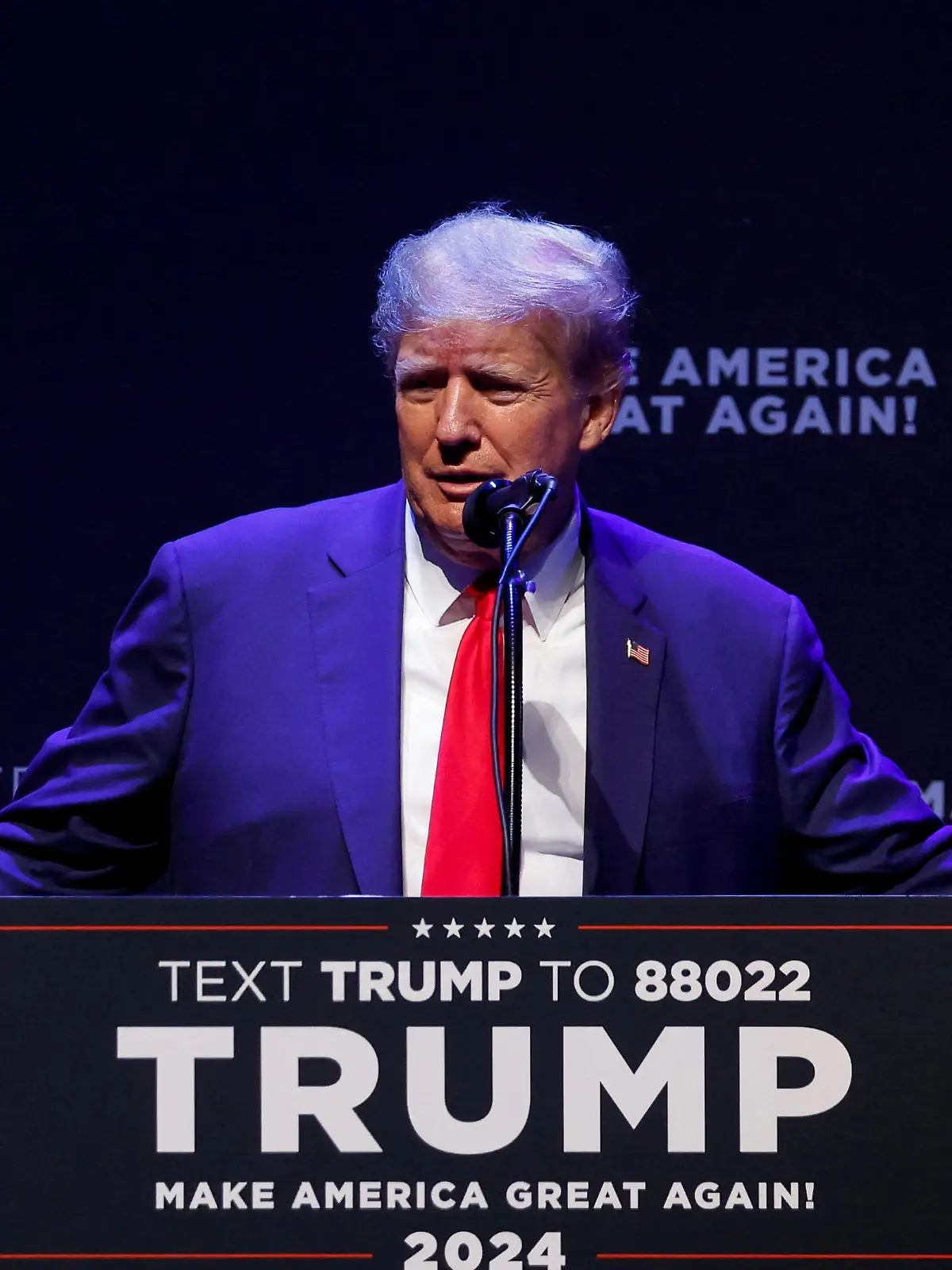 FILE PHOTO: Former U.S. President Donald Trump delivers remarks on education as he holds a campaign rally with supporters, in Davenport, Iowa, U.S. March 13, 2023. REUTERS/Jonathan Ernst/File Photo