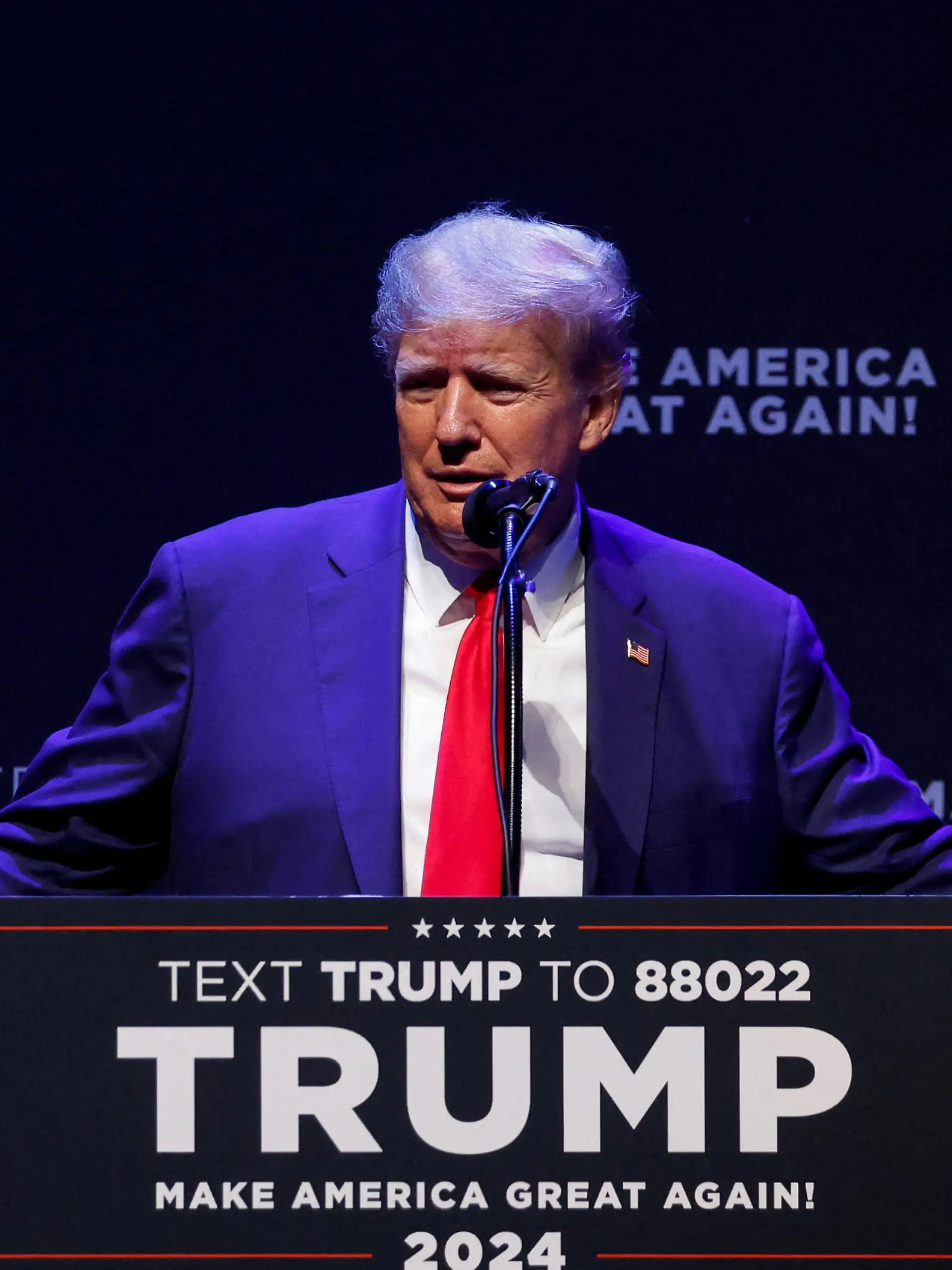 FILE PHOTO: Former U.S. President Donald Trump delivers remarks on education as he holds a campaign rally with supporters, in Davenport, Iowa, U.S. March 13, 2023. REUTERS/Jonathan Ernst/File Photo