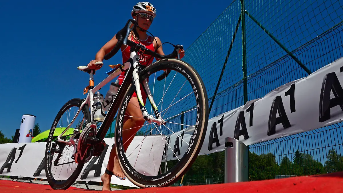 TRIATHLON - Trumer Triathlon 2014 OBERTRUM AM SEE,AUSTRIA,19.JUL.14 - TRIATHLON, CYCLING - Trumer Triathlon 2014. Image shows Nathalie Birli (AUT). PUBLICATIONxINxGERxHUNxONLY

Triathlon  Triathlon 2014  at Lake Austria 19 Jul 14 Triathlon Cycling  Triathlon 2014 Image Shows Nathalie Birli AUT