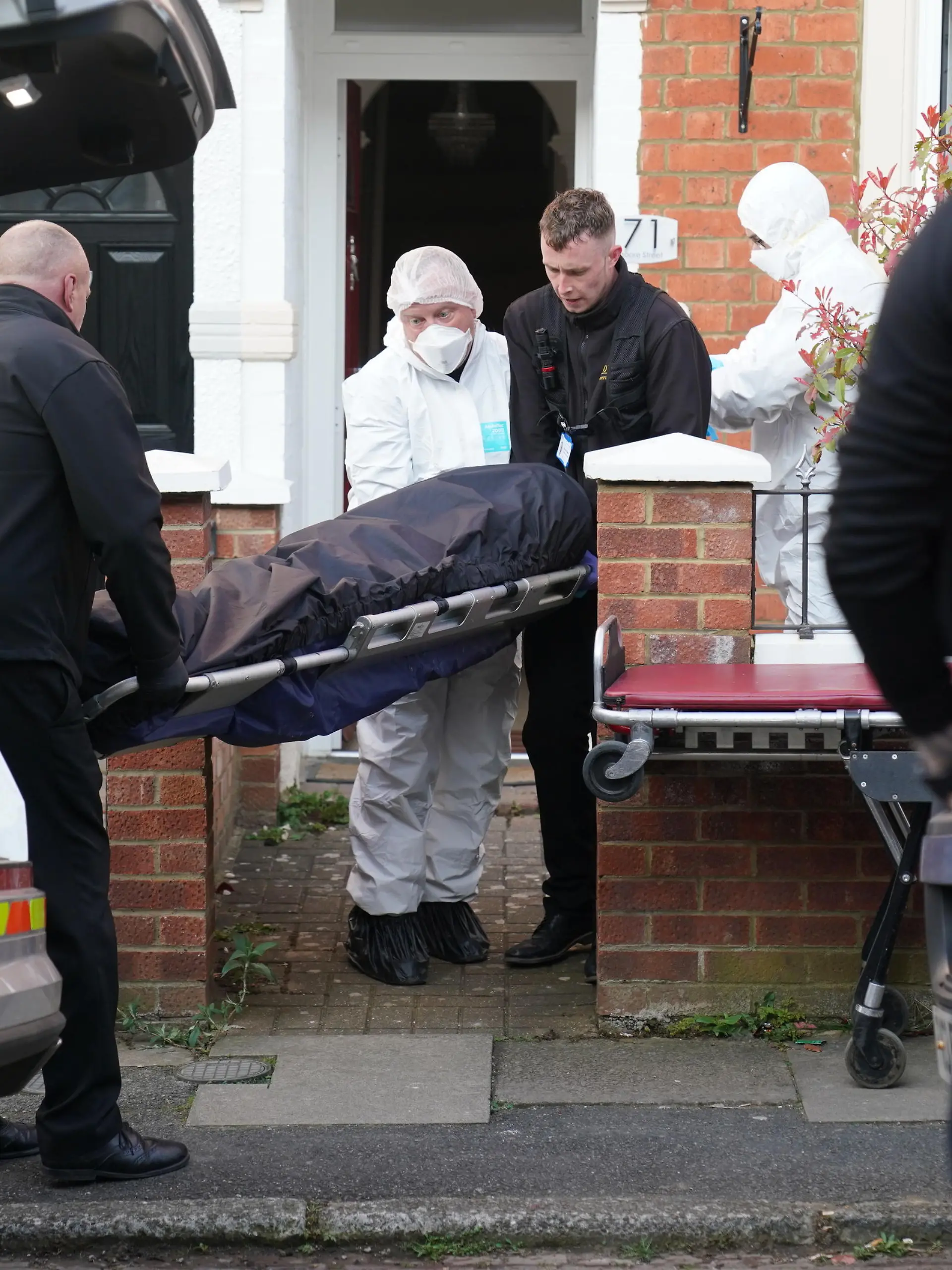 Body found in Northampton garden. The body is removed from the property in Moore Street, Kingsley, Northampton following its discovery in the rear garden. The remains are expected be taken to Leicester where they will be forensically examined by a Home Office pathologist but are believed to be that of a missing 42-year-old male. The investigation was mounted following the arrest of Fiona Beal, 48, at a hotel in Cumbria early on Wednesday morning. She has now been charged with murder. Picture date: Sunday March 20, 2022. See PA story POLICE Northampton. Photo credit should read: Jacob King/PA Wire URN:65964231