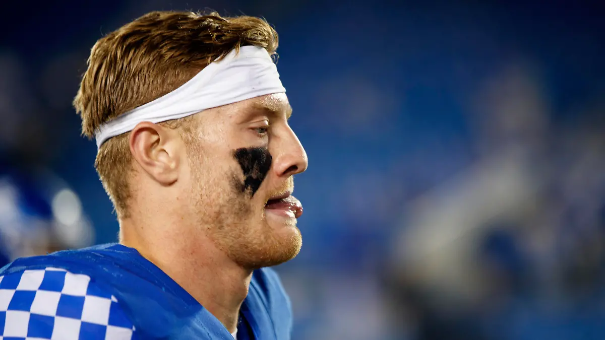 Kentucky quarterback Will Levis runs off the field after an NCAA college football game against Northern Illinois in Lexington, Ky., Saturday, Sept. 24, 2022. (AP Photo/Michael Clubb)