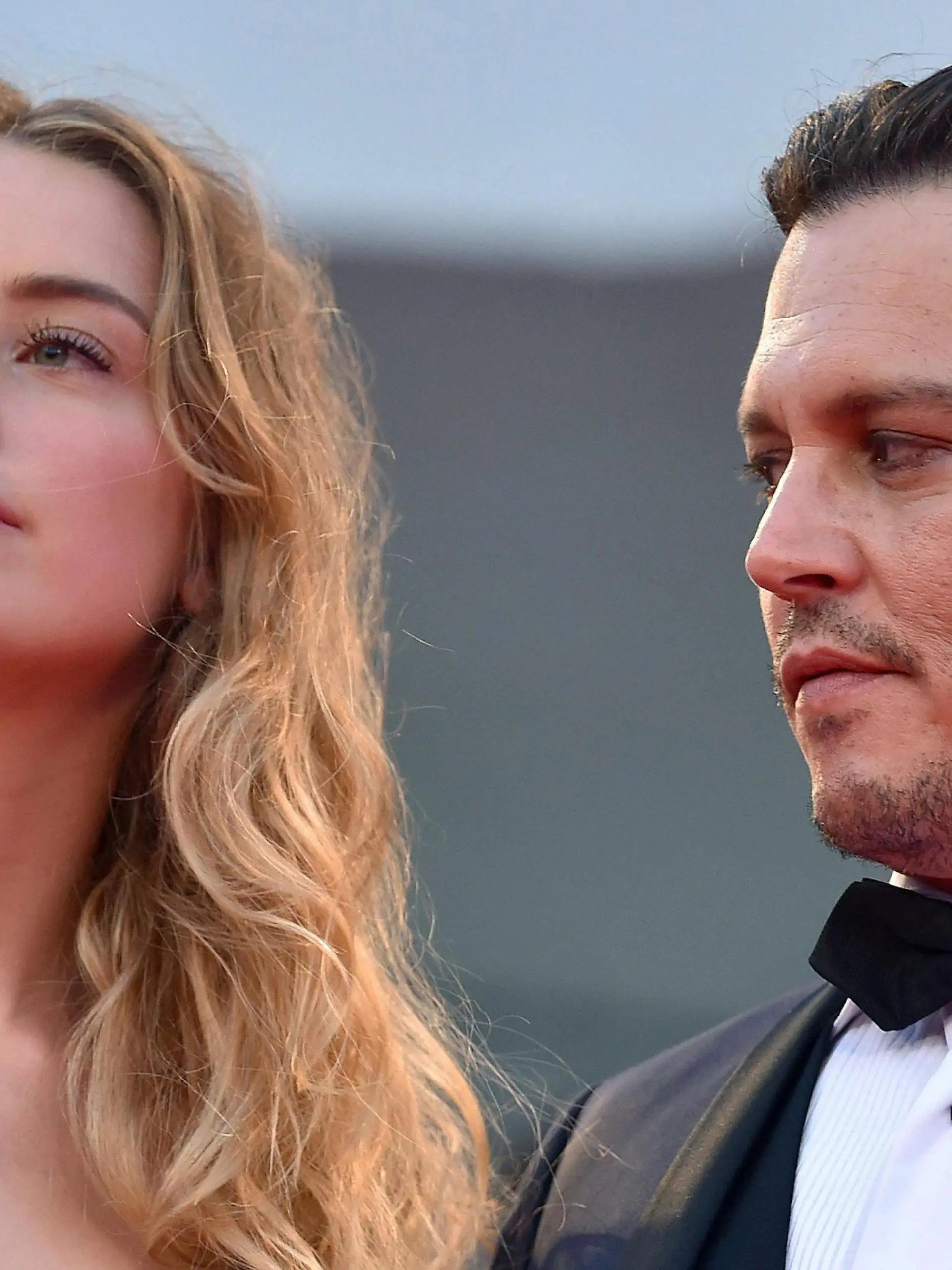 epa05329505 (FILE) A file picture dated 04 September 2015 shows US actor/cast member Johnny Depp (R) and his wife US actress Amber Heard arriving for the premiere of 'Black Mass', at the 72nd annual Venice International Film Festival, in Venice, Italy. According to media reports on 26 May 2016, Johnny Depp and Amber Heard are set to divorce. EPA/ETTORE FERRARI +++(c) dpa - Bildfunk+++