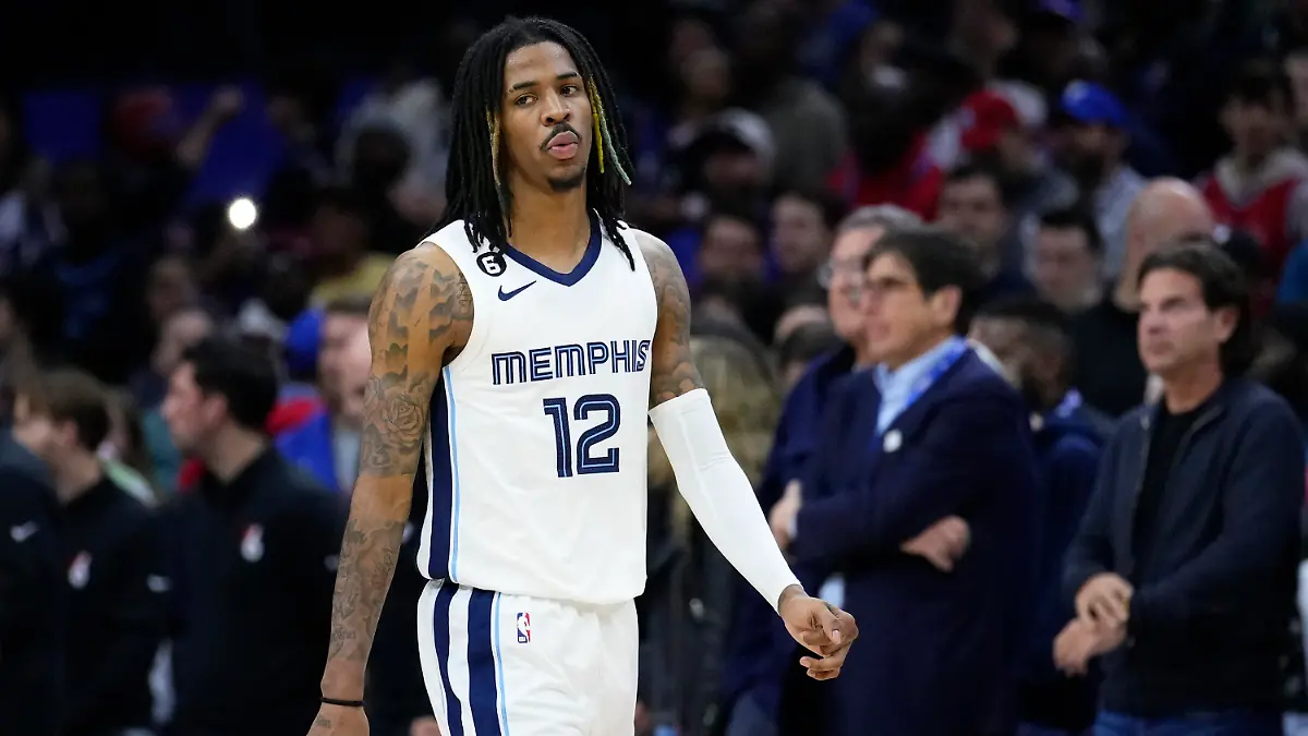 Memphis Grizzlies' Ja Morant walks the court during the final seconds of an NBA basketball game against the Philadelphia 76ers, Thursday, Feb. 23, 2023, in Philadelphia. (AP Photo/Matt Slocum)